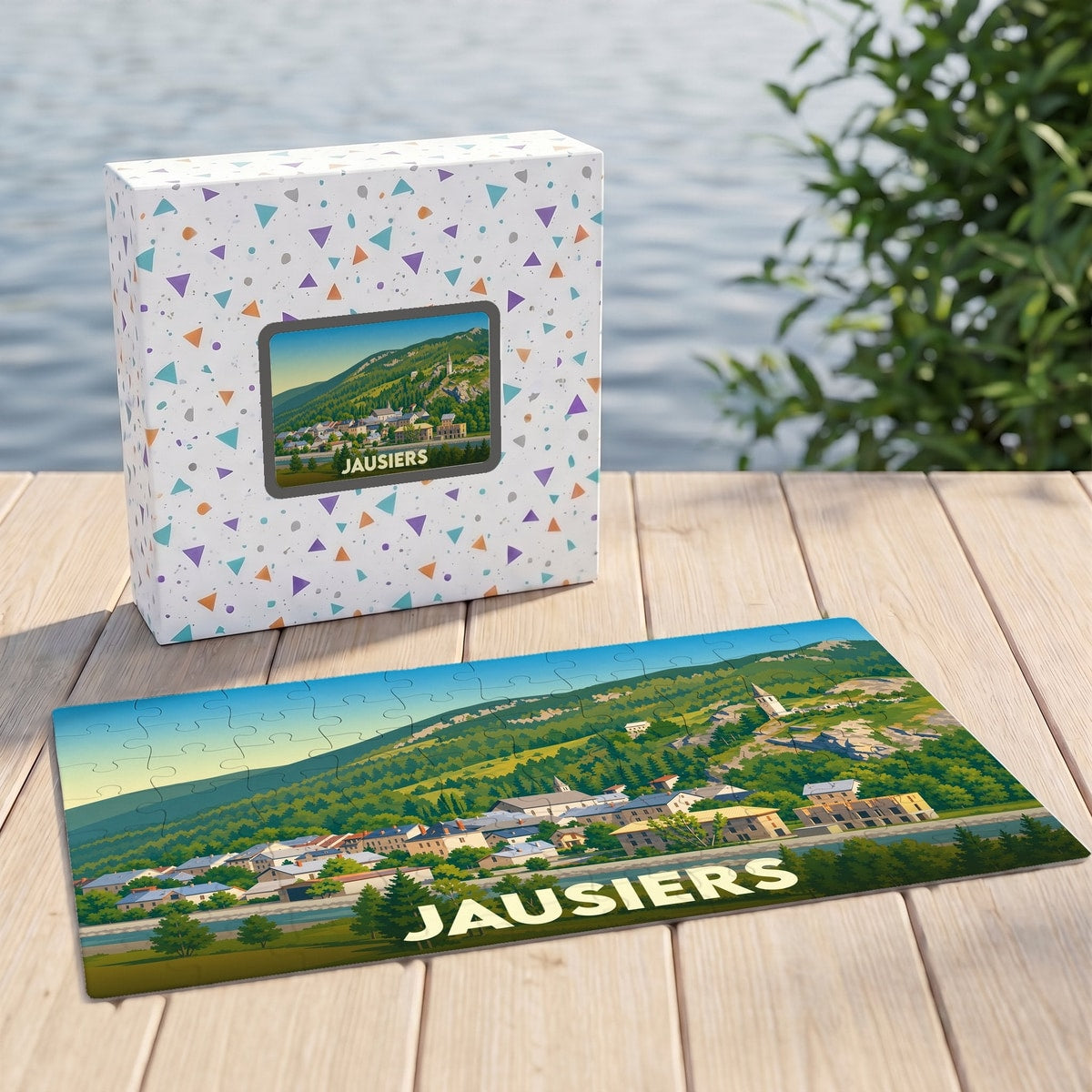 Puzzle souvenir de la ville de Jausiers illustrant un paysage montagneux stylisé.