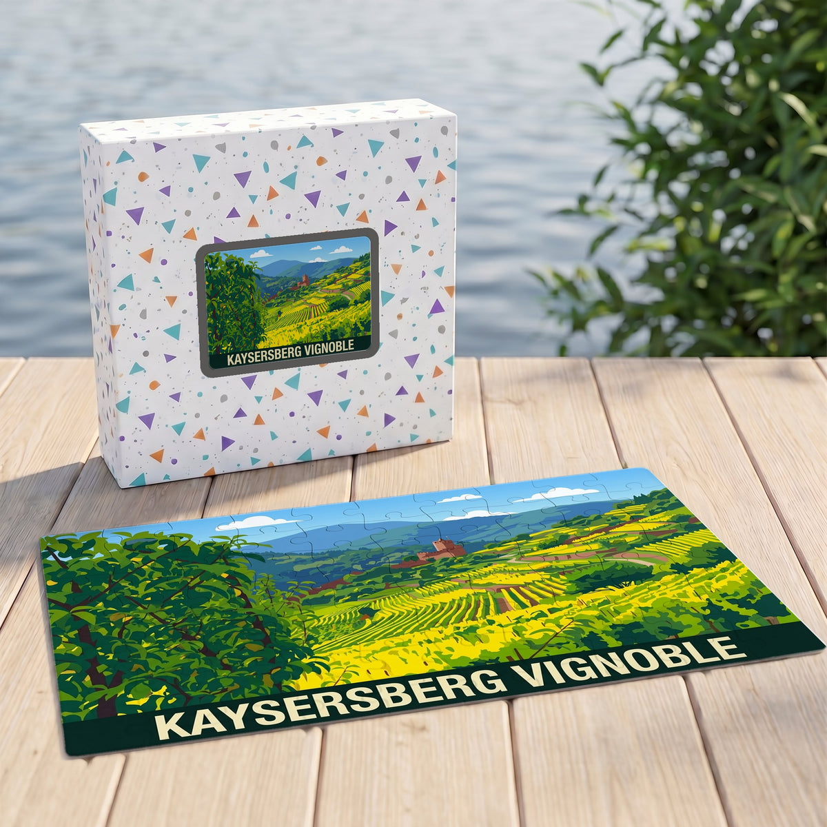 Puzzle souvenir de Kaysersberg Vignoble avec une illustration stylisée d'un paysage de vignes.