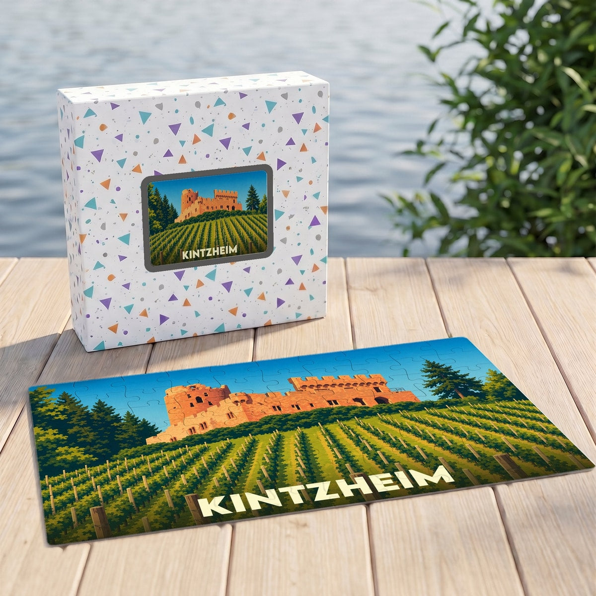 Puzzle souvenir de la ville de Kintzheim illustrant son château et ses vignobles dans un style graphique épuré.