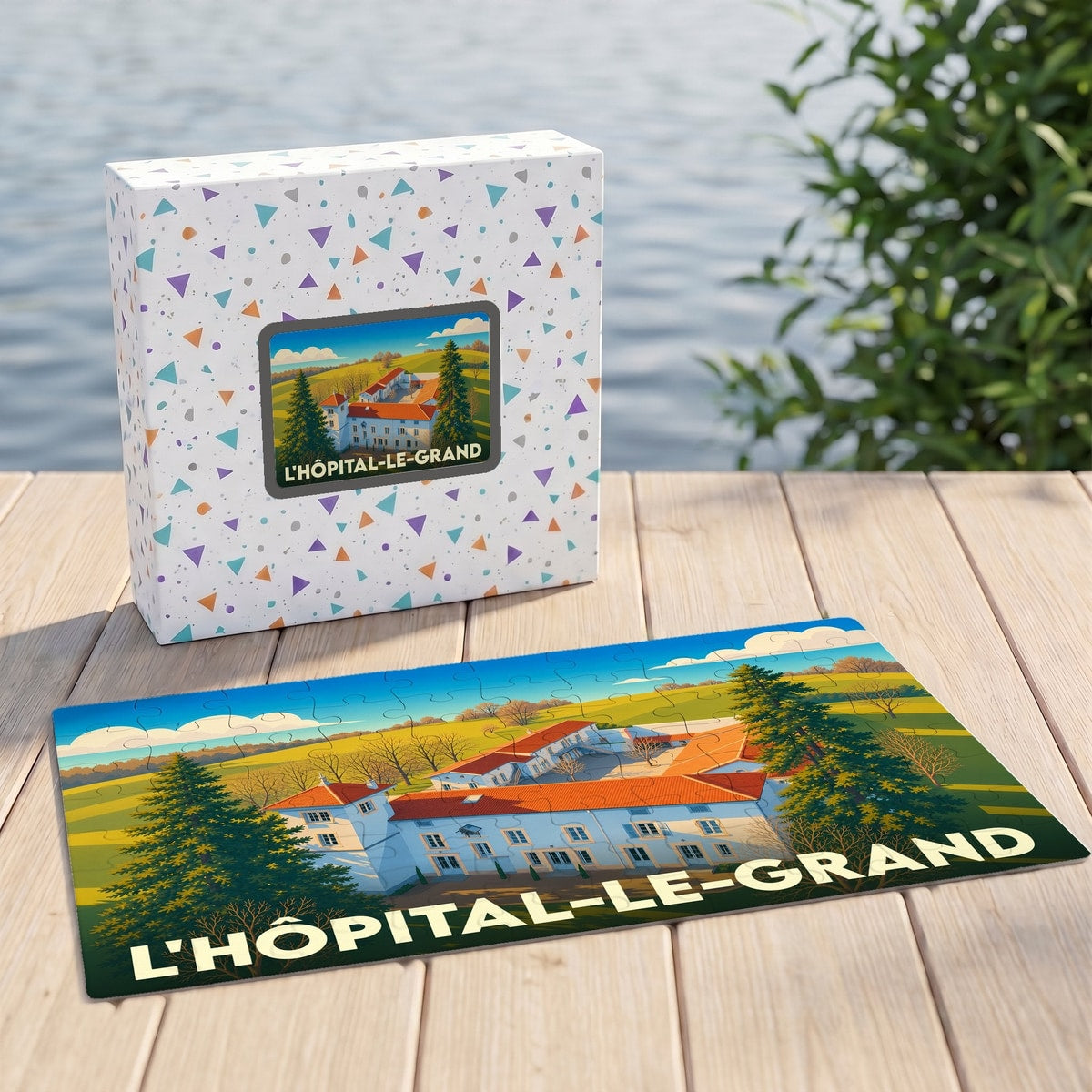 Puzzle souvenir de la ville de L'Hôpital-le-Grand avec une illustration stylisée de son paysage et de ses bâtiments.