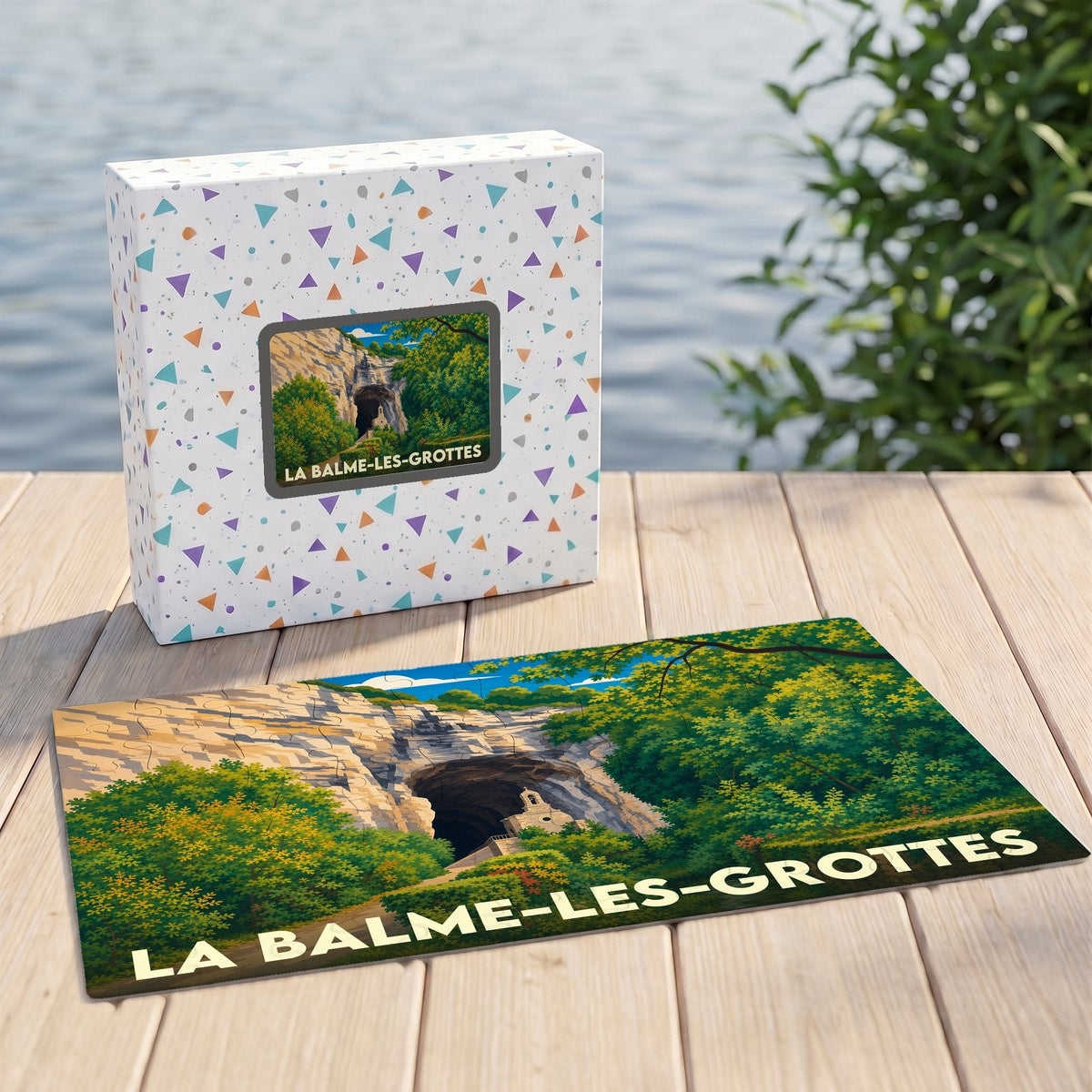 Puzzle souvenir de la ville de La Balme-les-Grottes avec une illustration stylisée de ses célèbres grottes.