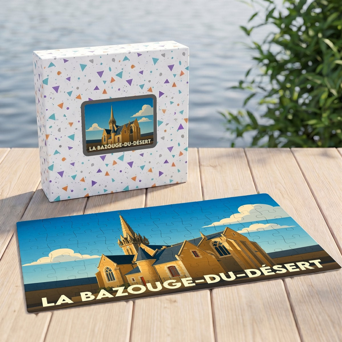 Puzzle souvenir de la ville de La Bazouge-du-Désert avec une illustration stylisée d'une église.