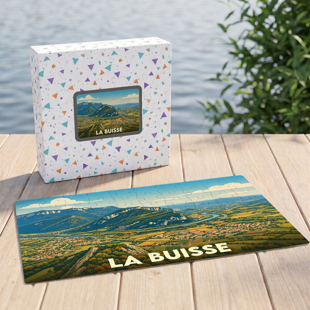 Puzzle souvenir de la ville de La Buisse avec une illustration panoramique de ses paysages.