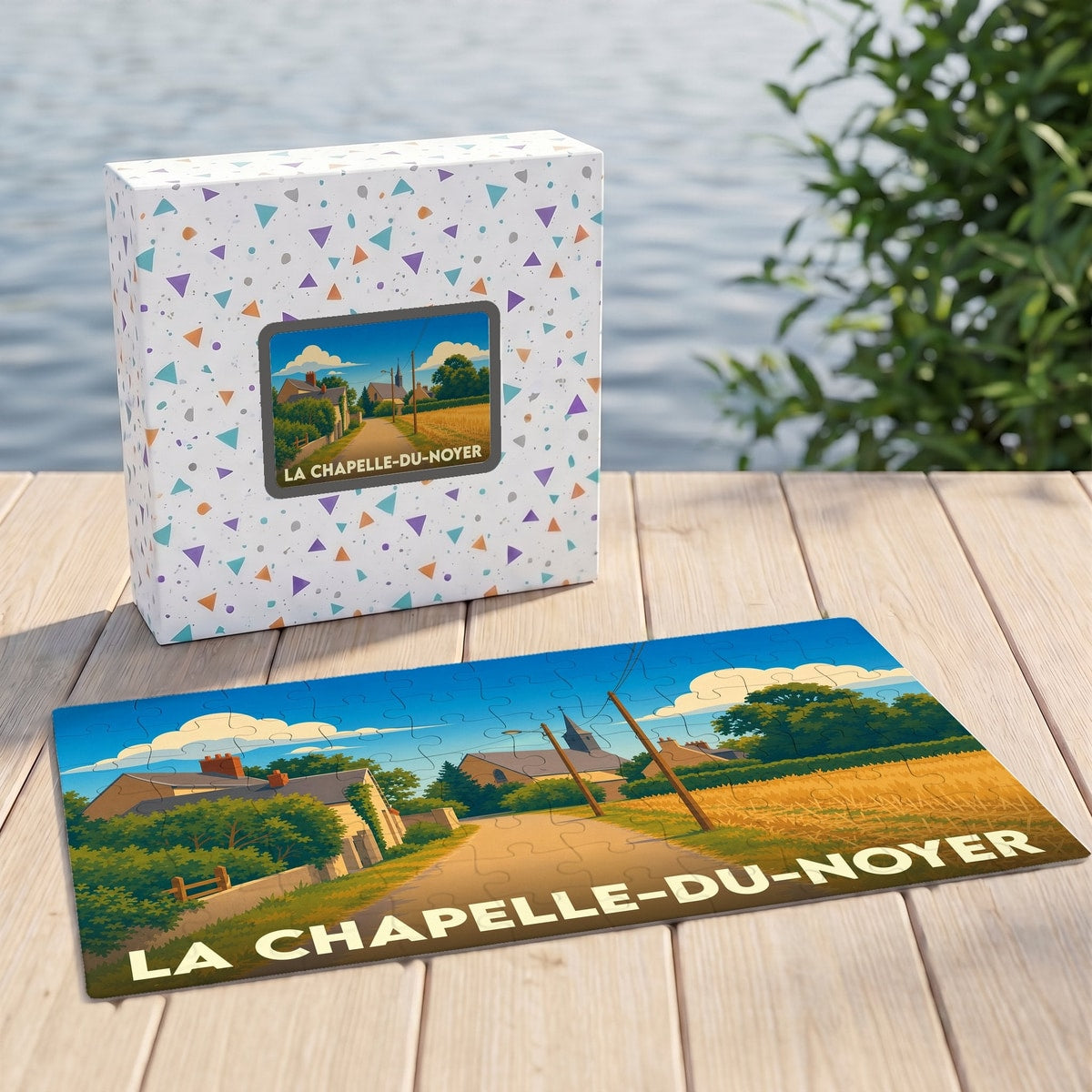 Puzzle souvenir de la ville de La Chapelle-du-Noyer avec une illustration stylisée d'un paysage rural.