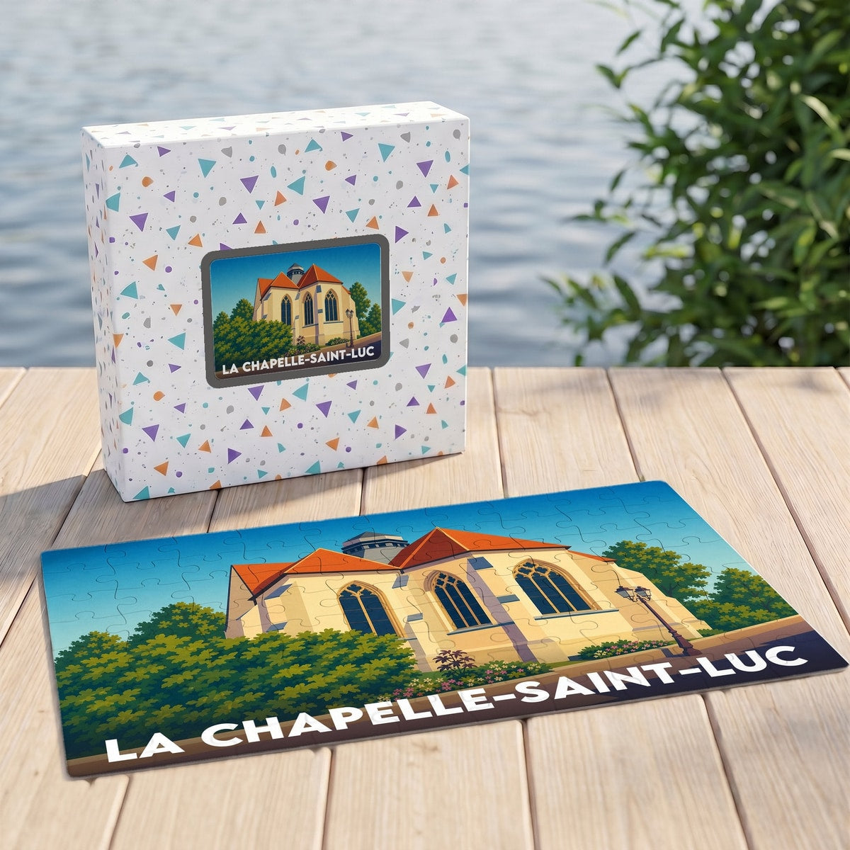 Puzzle souvenir de la ville de La Chapelle-Saint-Luc avec une illustration stylisée de son église.