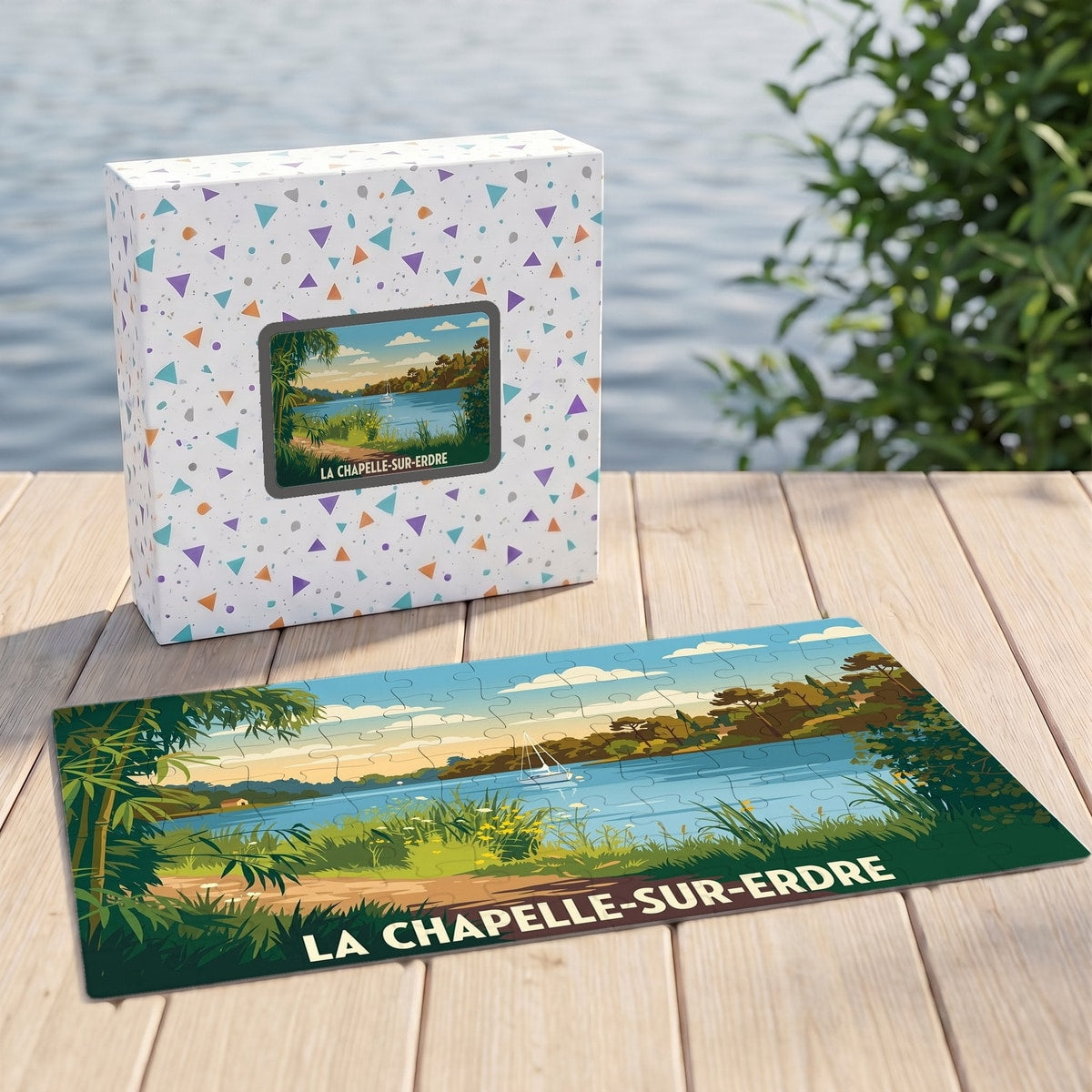 Puzzle souvenir de la ville de La Chapelle-sur-Erdre illustré par un paysage de bord de rivière.