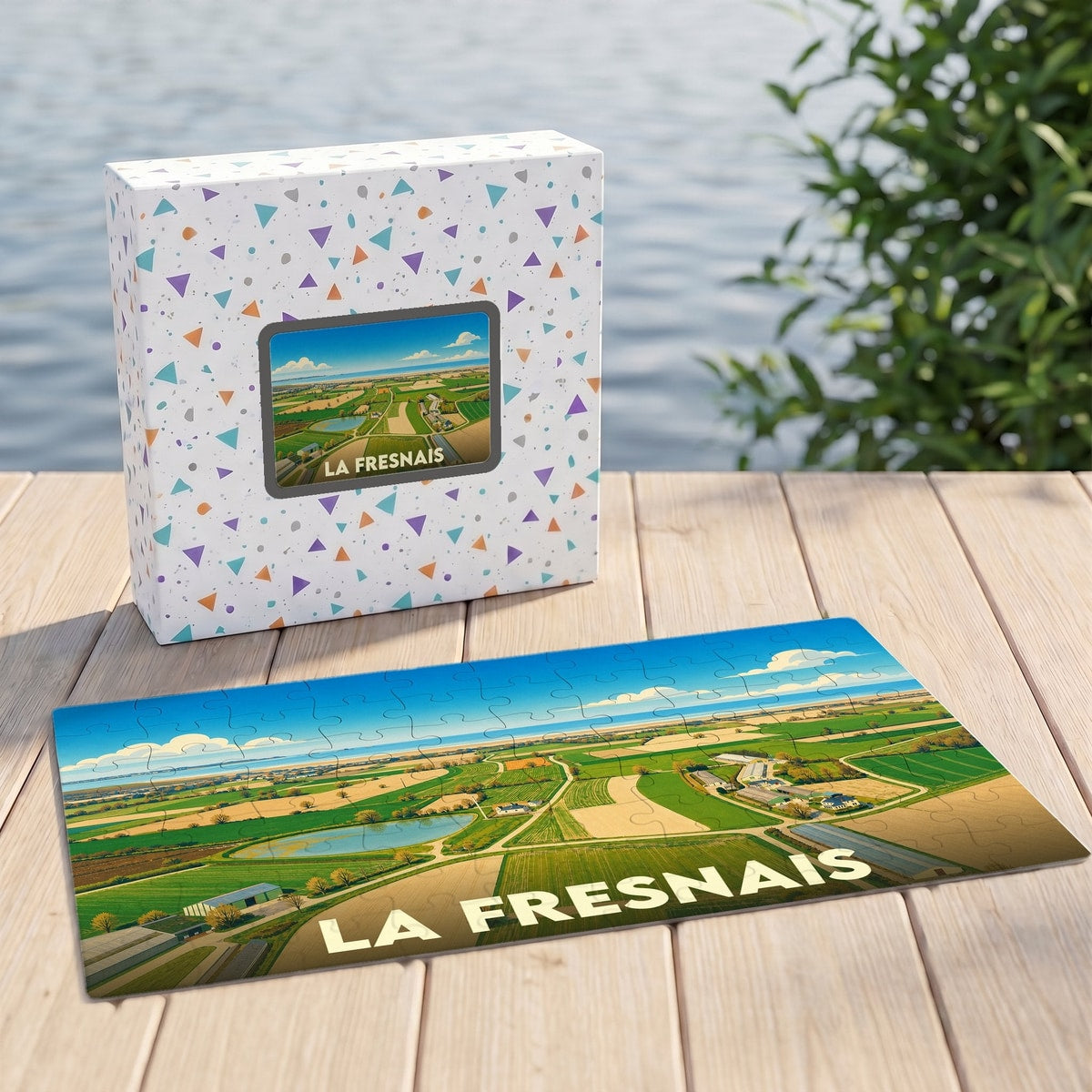 Puzzle souvenir de la ville de La Fresnais avec une illustration de paysage rural et côtier.