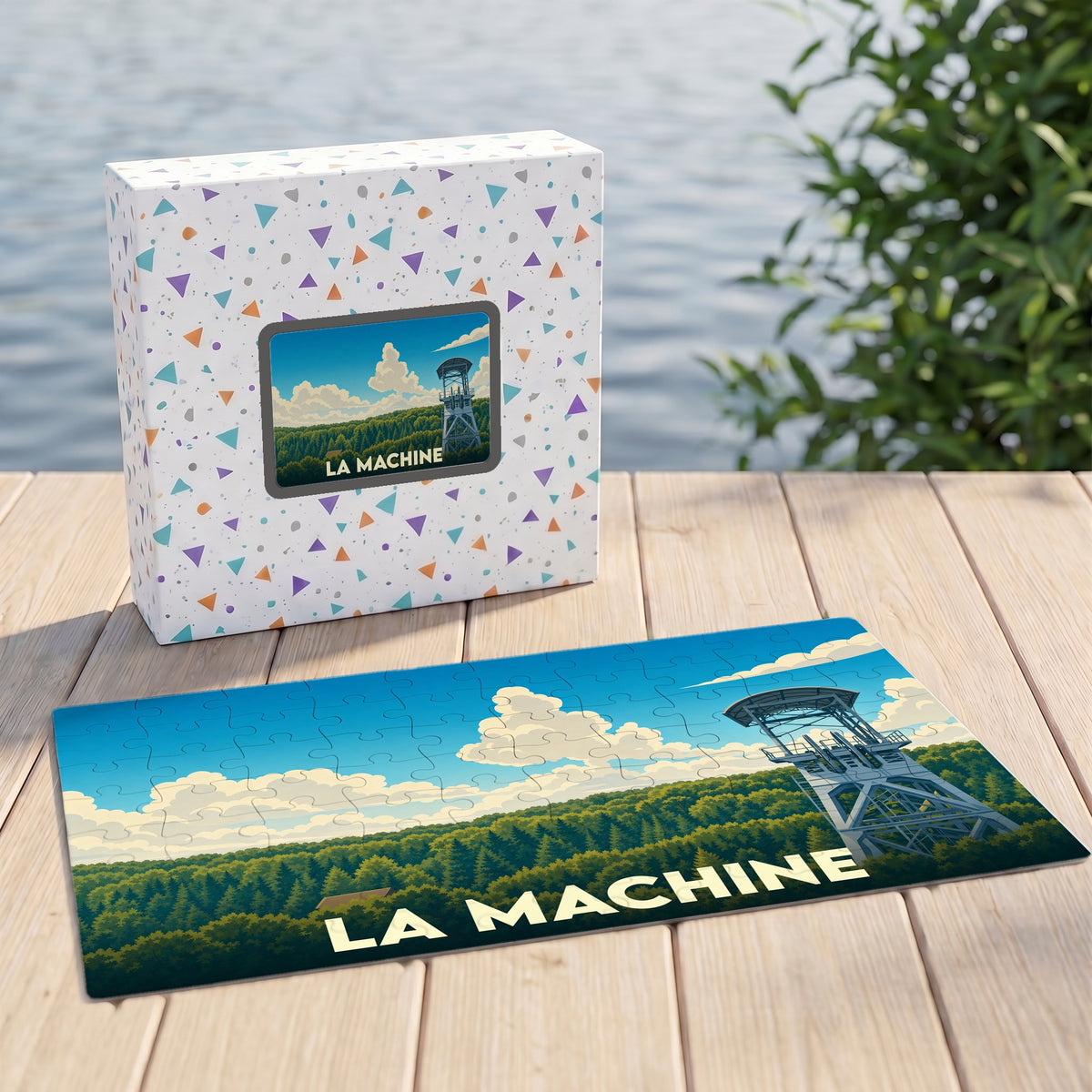Puzzle souvenir de la ville de La Machine représentant un chevalement minier dans un paysage forestier stylisé.