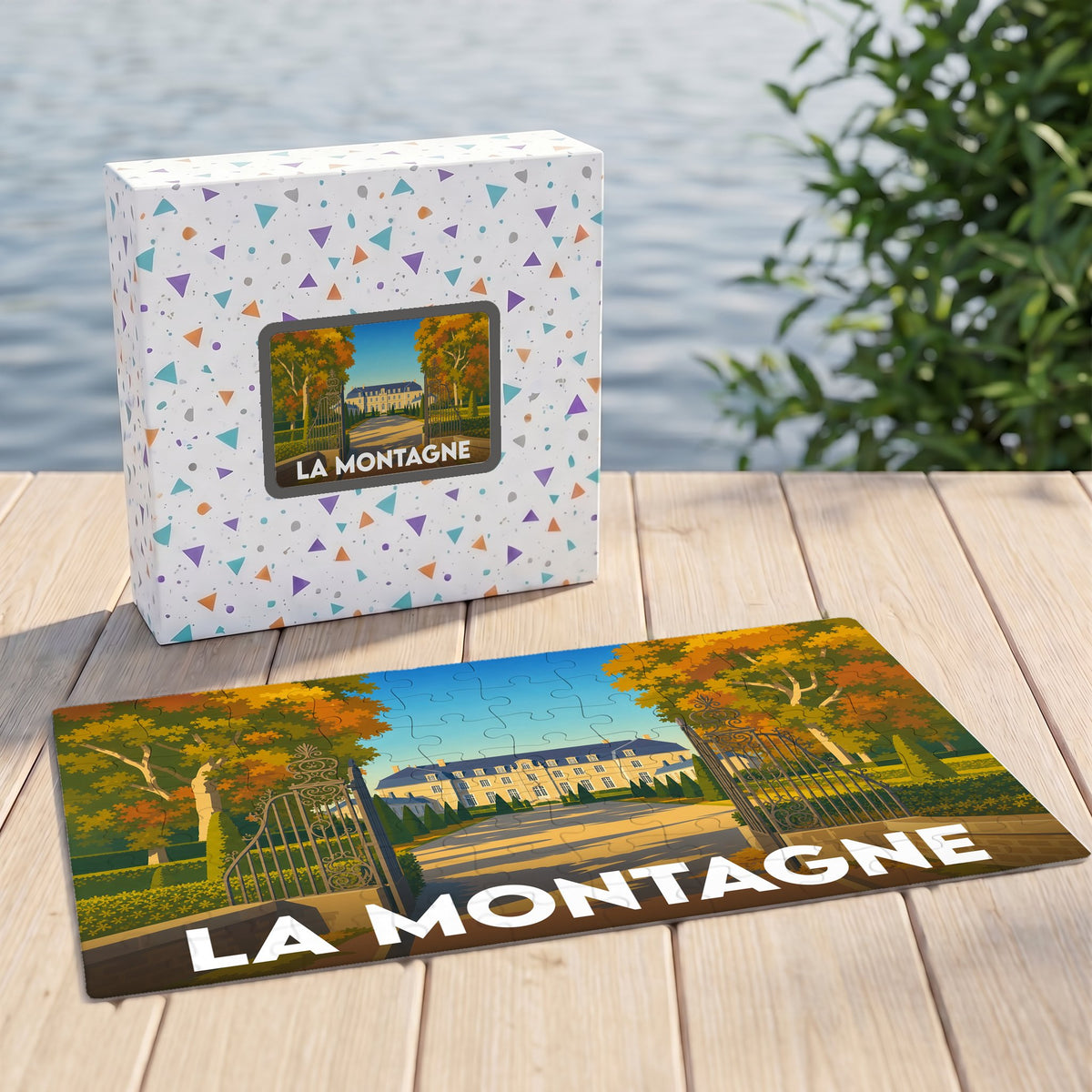 Puzzle souvenir de la ville de La Montagne avec une illustration stylisée représentant un château derrière une grille.