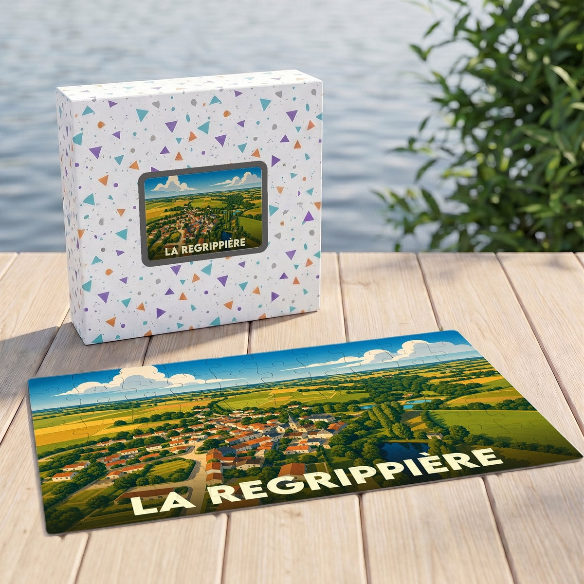 Puzzle souvenir de la ville de La Regrippière avec une illustration stylisée de son paysage.