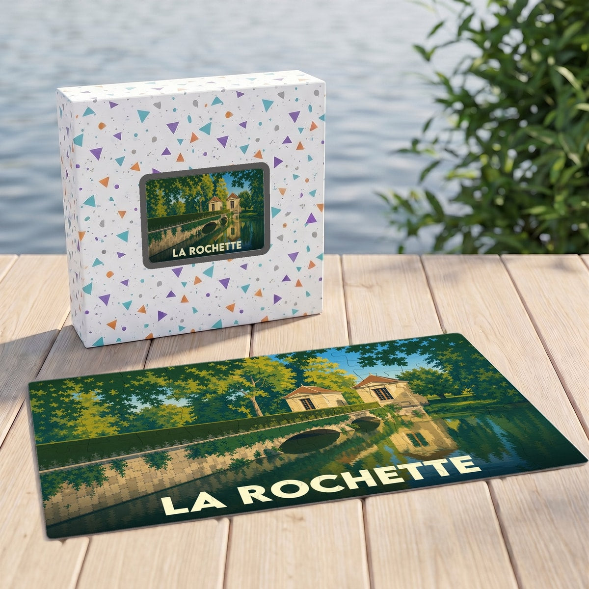 Puzzle souvenir de la ville de La Rochette avec une illustration stylisée d'un pont et de ses pavillons.