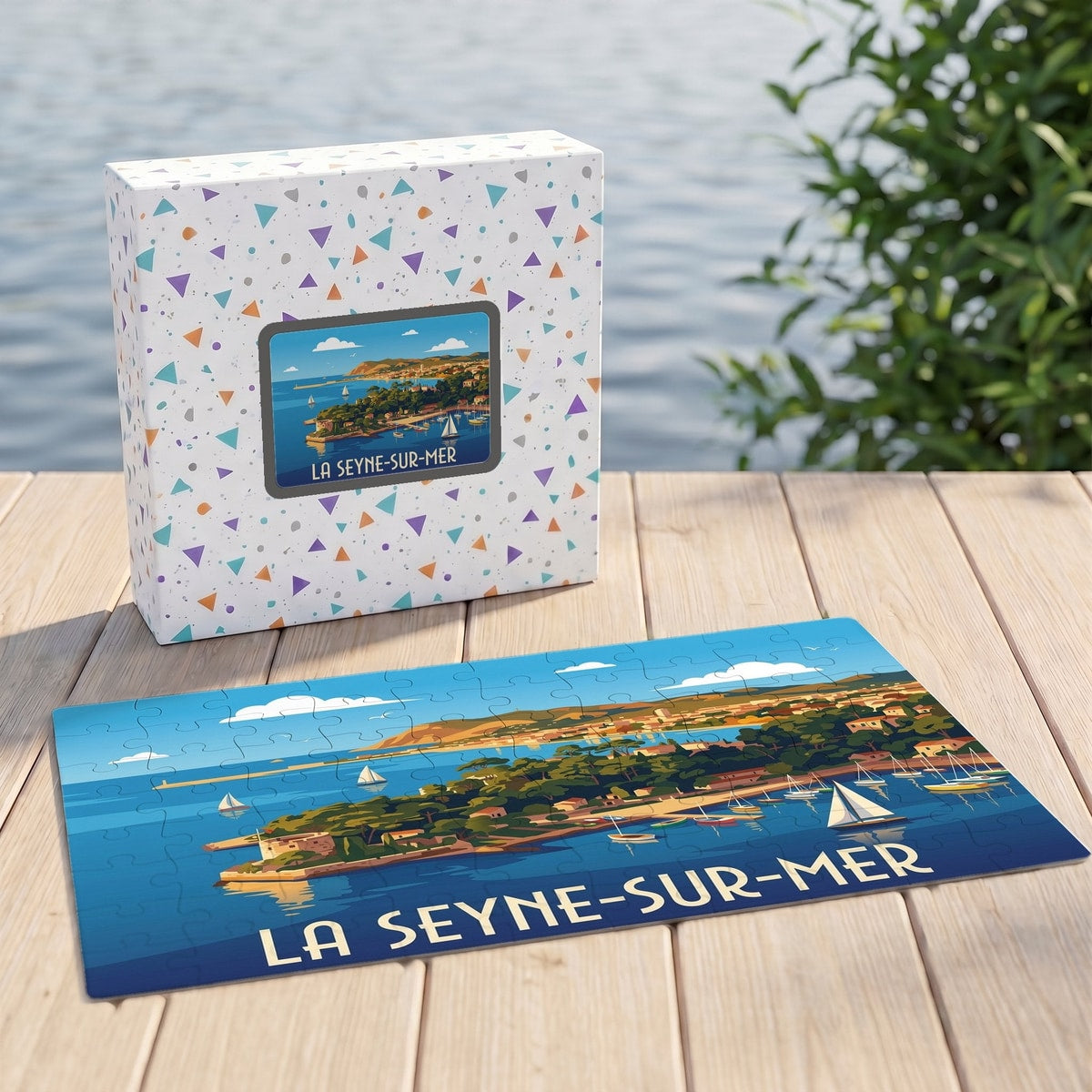 Puzzle souvenir de la ville de La Seyne-sur-Mer avec une illustration stylisée de son littoral et de ses voiliers.