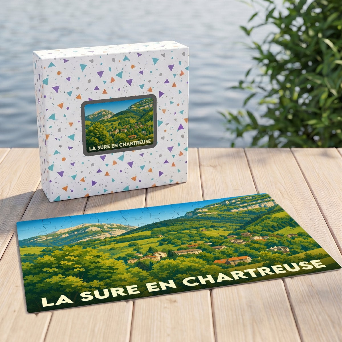 Puzzle souvenir de la ville de La Sure en Chartreuse avec une illustration de paysage montagneux.