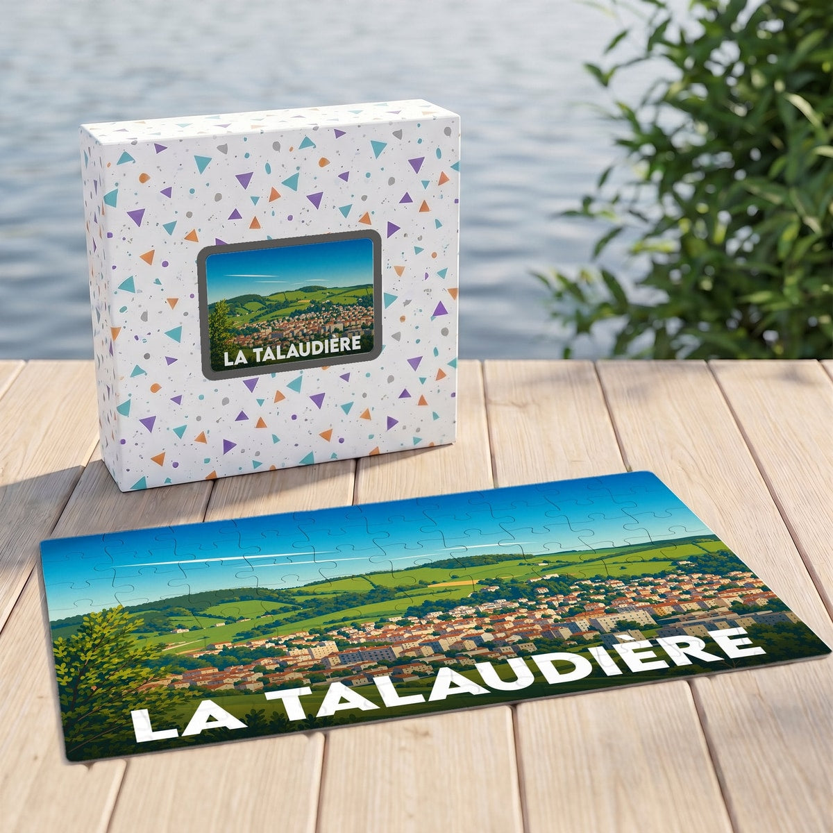 Puzzle souvenir de la ville de La Talaudière avec une illustration panoramique stylisée.