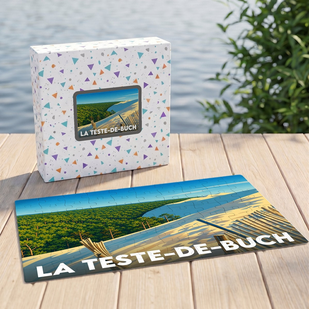 Puzzle souvenir de la ville de La Teste-de-Buch avec une illustration stylisée de la Dune du Pilat.