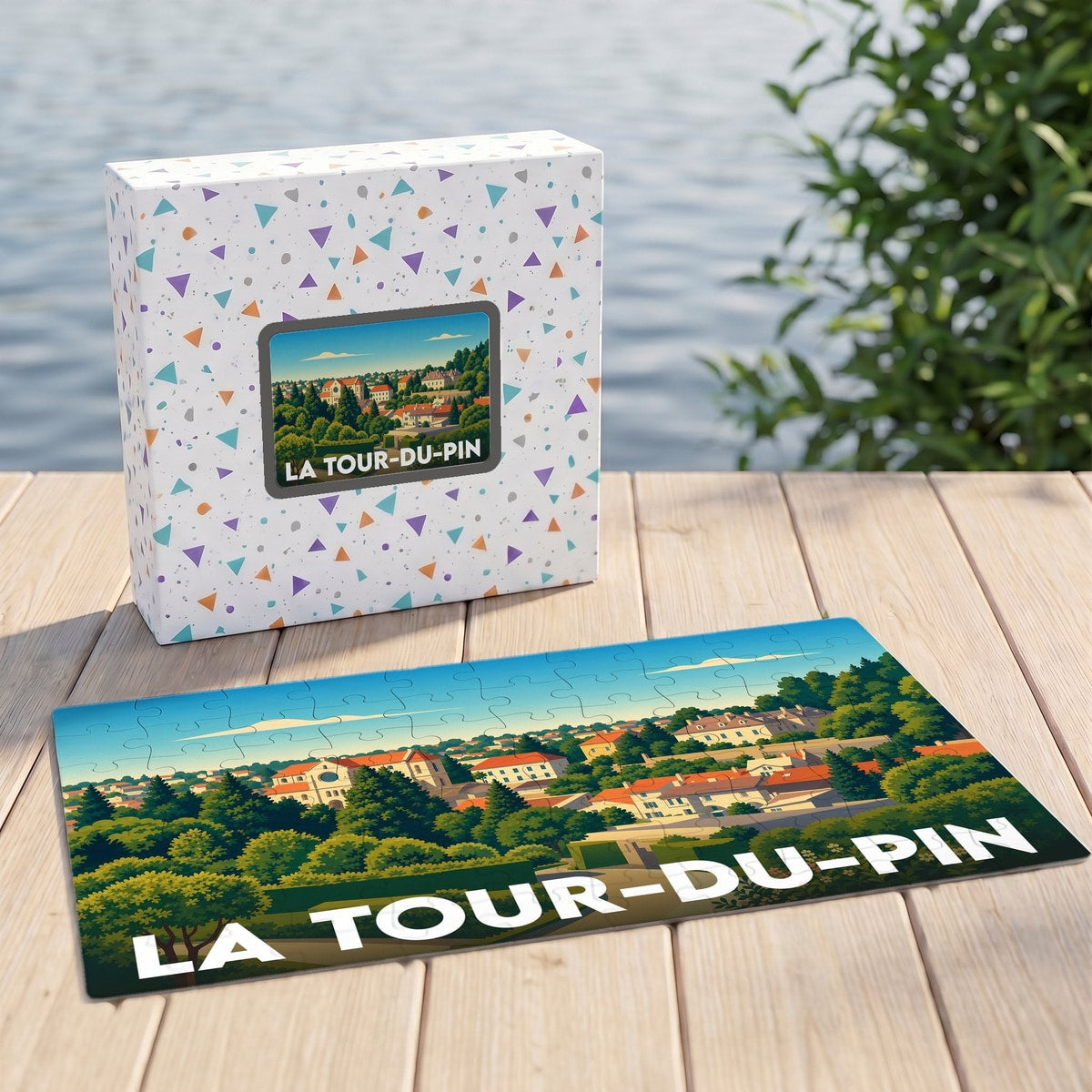 Puzzle souvenir de la ville de La Tour-du-Pin avec une illustration stylisée et colorée du paysage urbain.