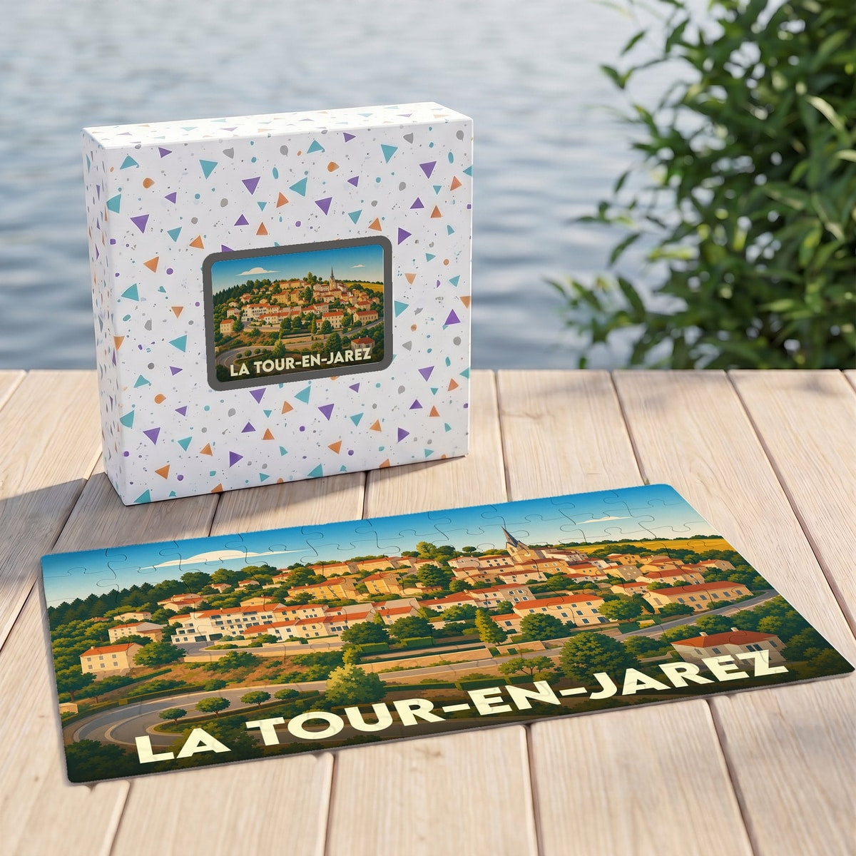 Puzzle souvenir de la ville de La Tour-en-Jarez avec une illustration stylisée de ses collines et habitations.
