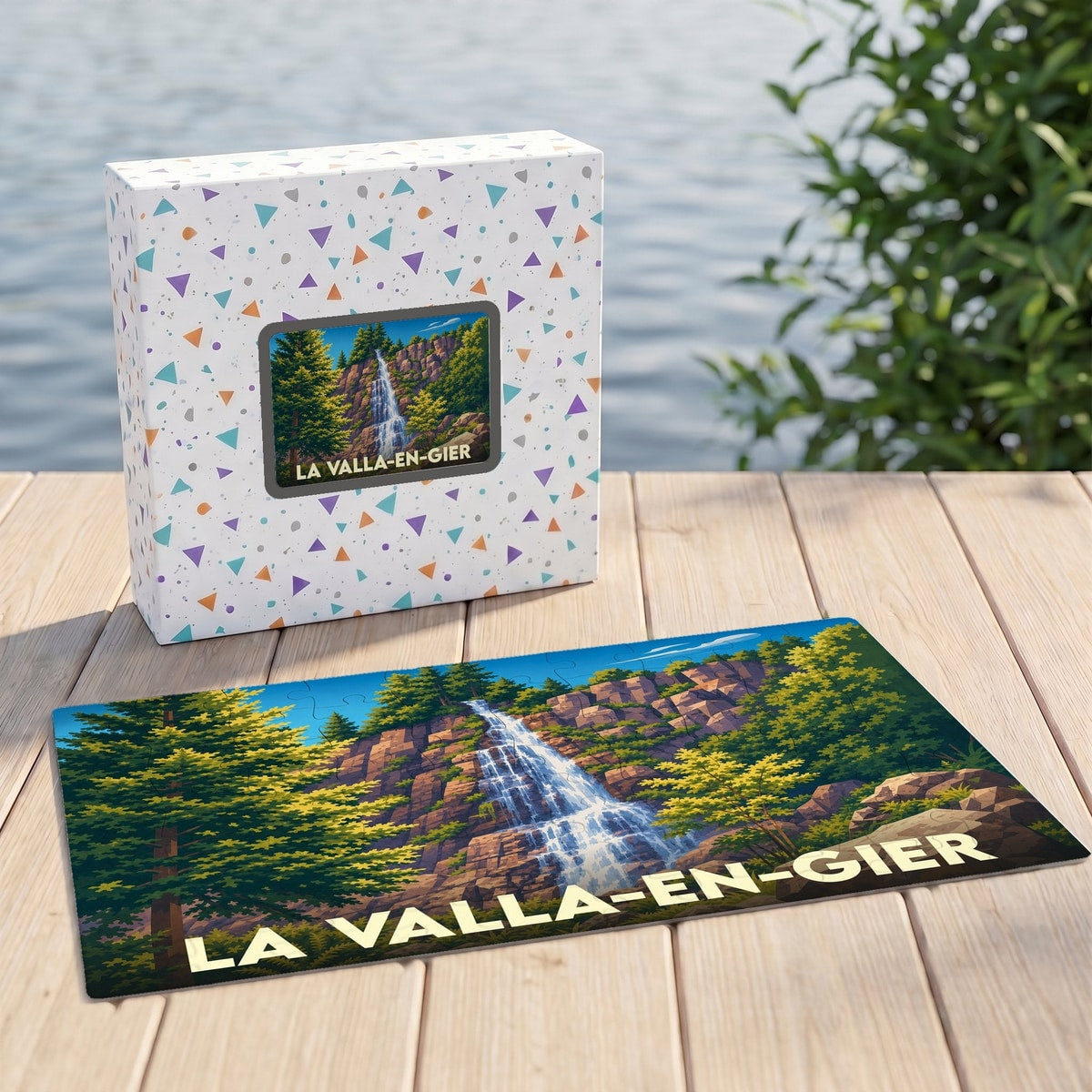 Puzzle souvenir de la ville de La Valla-en-Gier avec une illustration de cascade dans son coffret assorti.