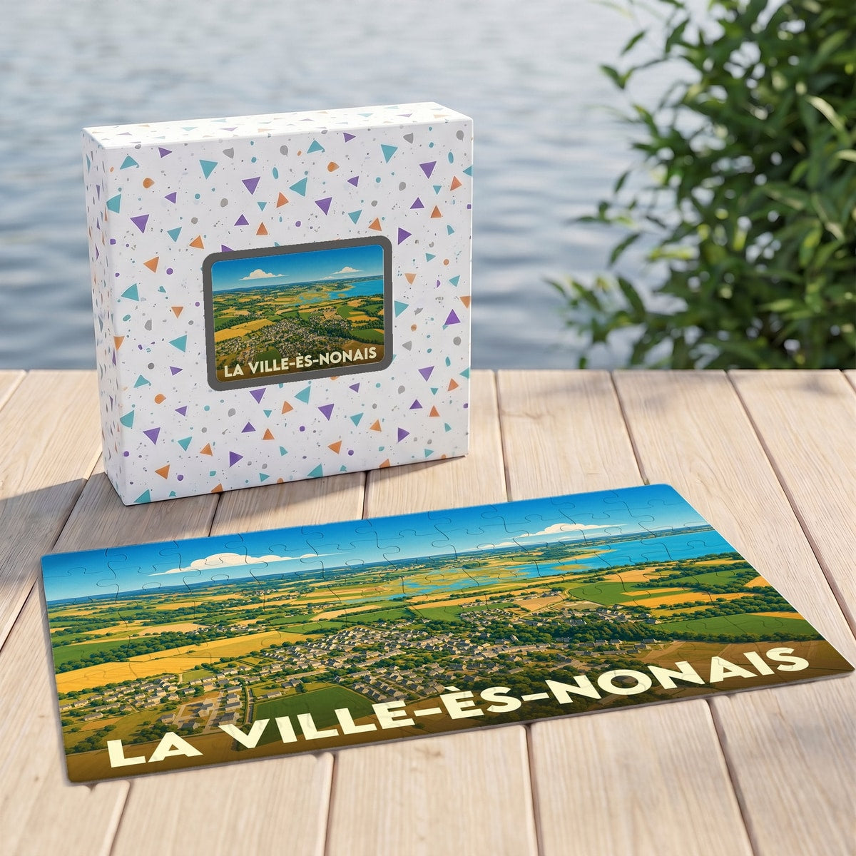 Puzzle souvenir de la ville de La Ville-ès-Nonais représentant une vue aérienne illustrée.