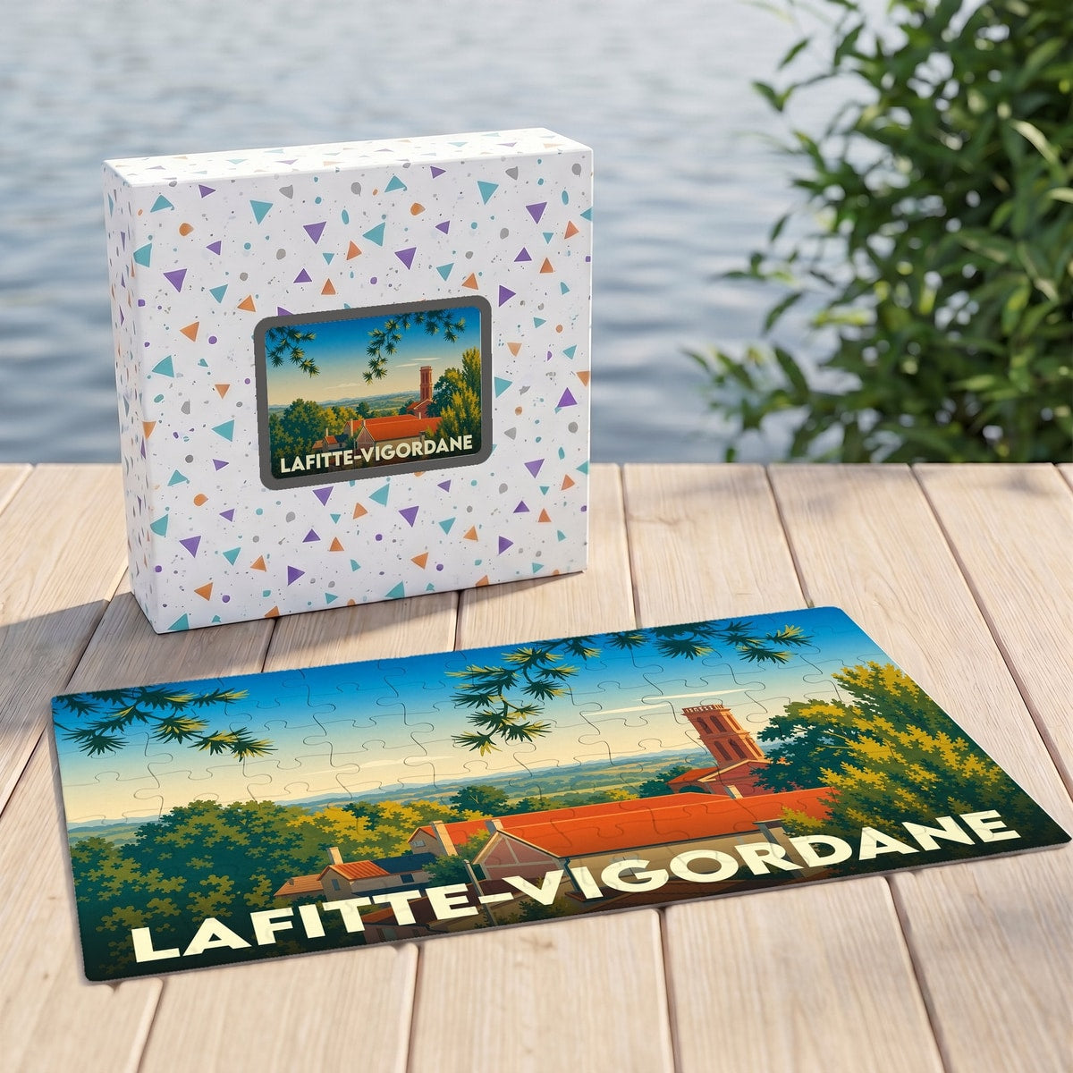 Puzzle souvenir de la ville de Lafitte-Vigordane avec une illustration stylisée et colorée de son paysage.