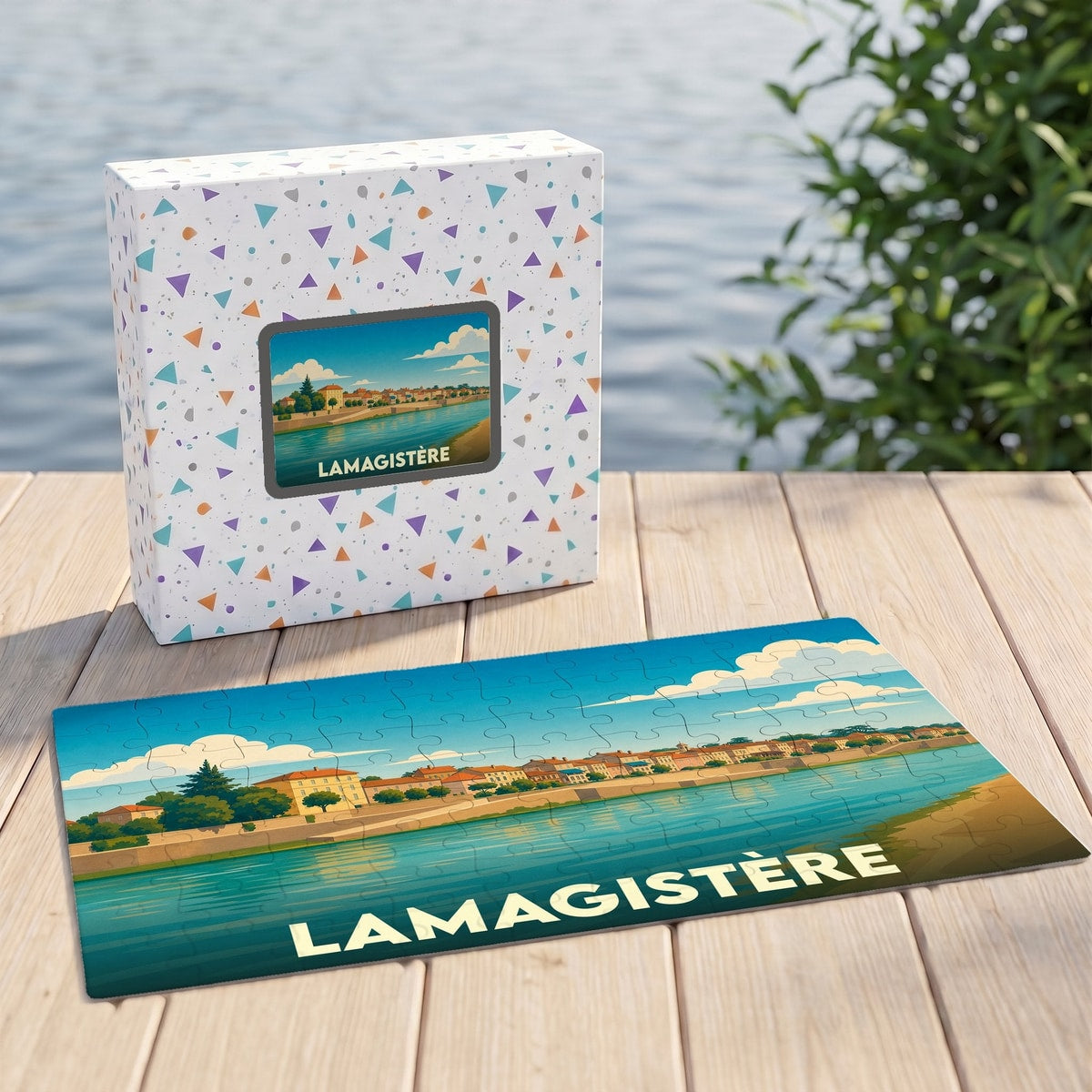 Puzzle souvenir de la ville de Lamagistère présentant une illustration stylisée des bords de Garonne.