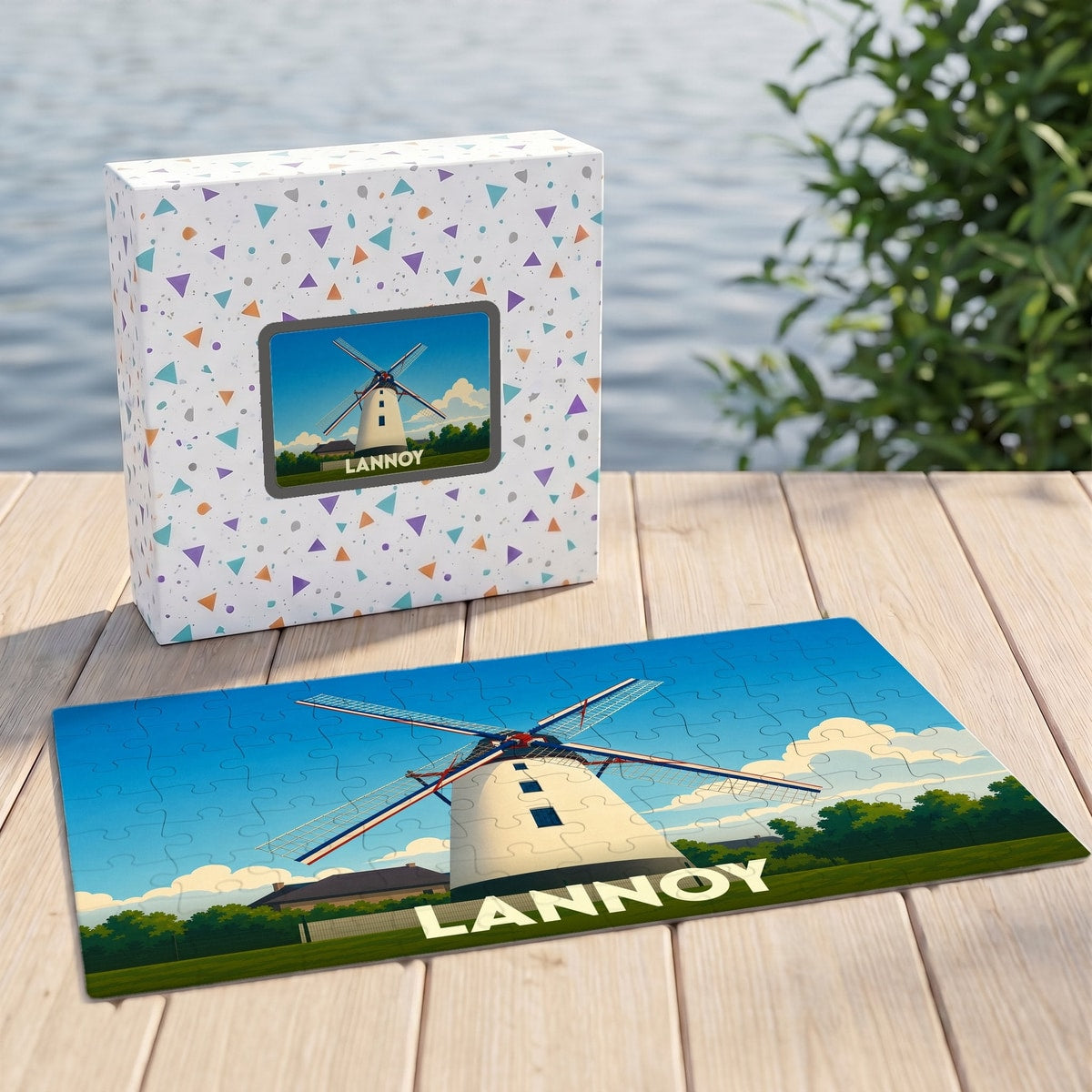 Puzzle souvenir de la ville de Lannoy illustrant un moulin blanc sous un ciel bleu.