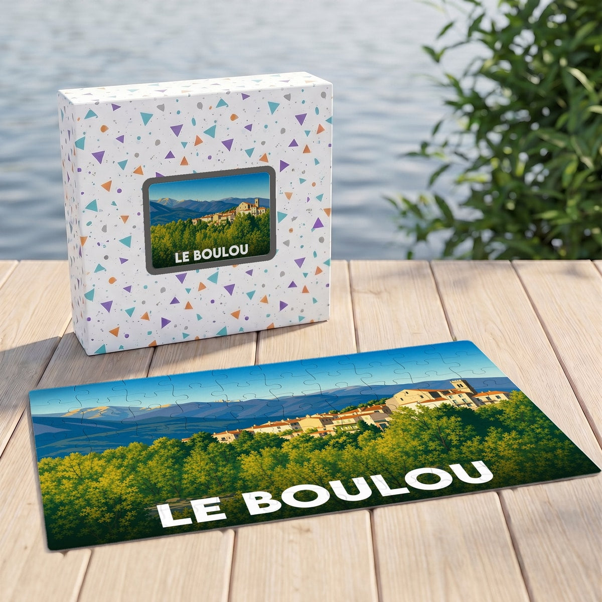 Puzzle souvenir de la ville de Le Boulou avec une illustration stylisée de son paysage.