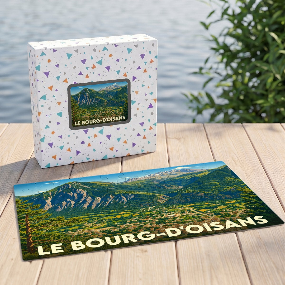 Puzzle souvenir de la ville de Le Bourg-d'Oisans avec une illustration panoramique de sa vallée montagneuse.