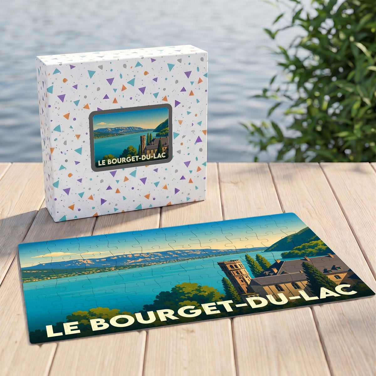 Puzzle souvenir de la ville du Bourget-du-Lac avec une illustration stylisée du lac et de son château.