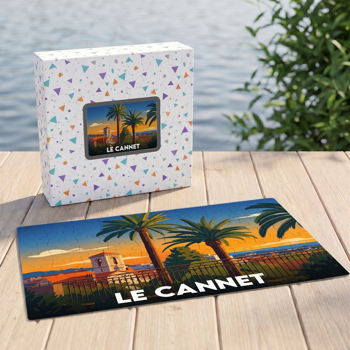 Puzzle souvenir de la ville de Le Cannet avec une illustration stylisée d'un coucher de soleil sur la Côte d'Azur.