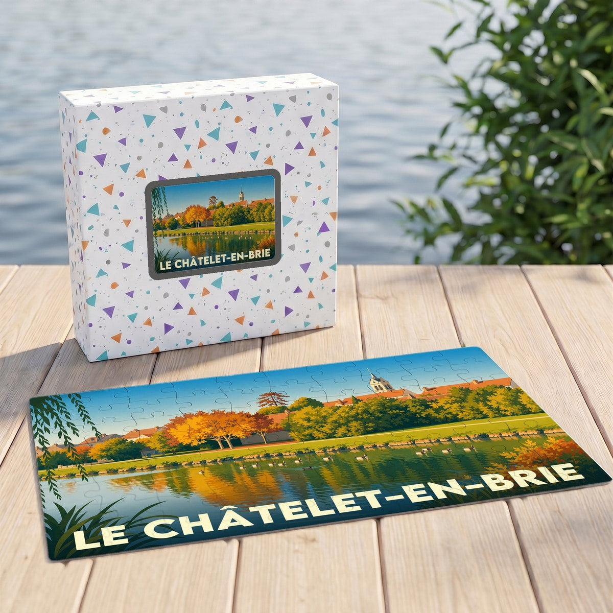 Puzzle souvenir de la ville de Le Châtelet-en-Brie illustrant un paysage de bord de l'eau aux couleurs d'automne.