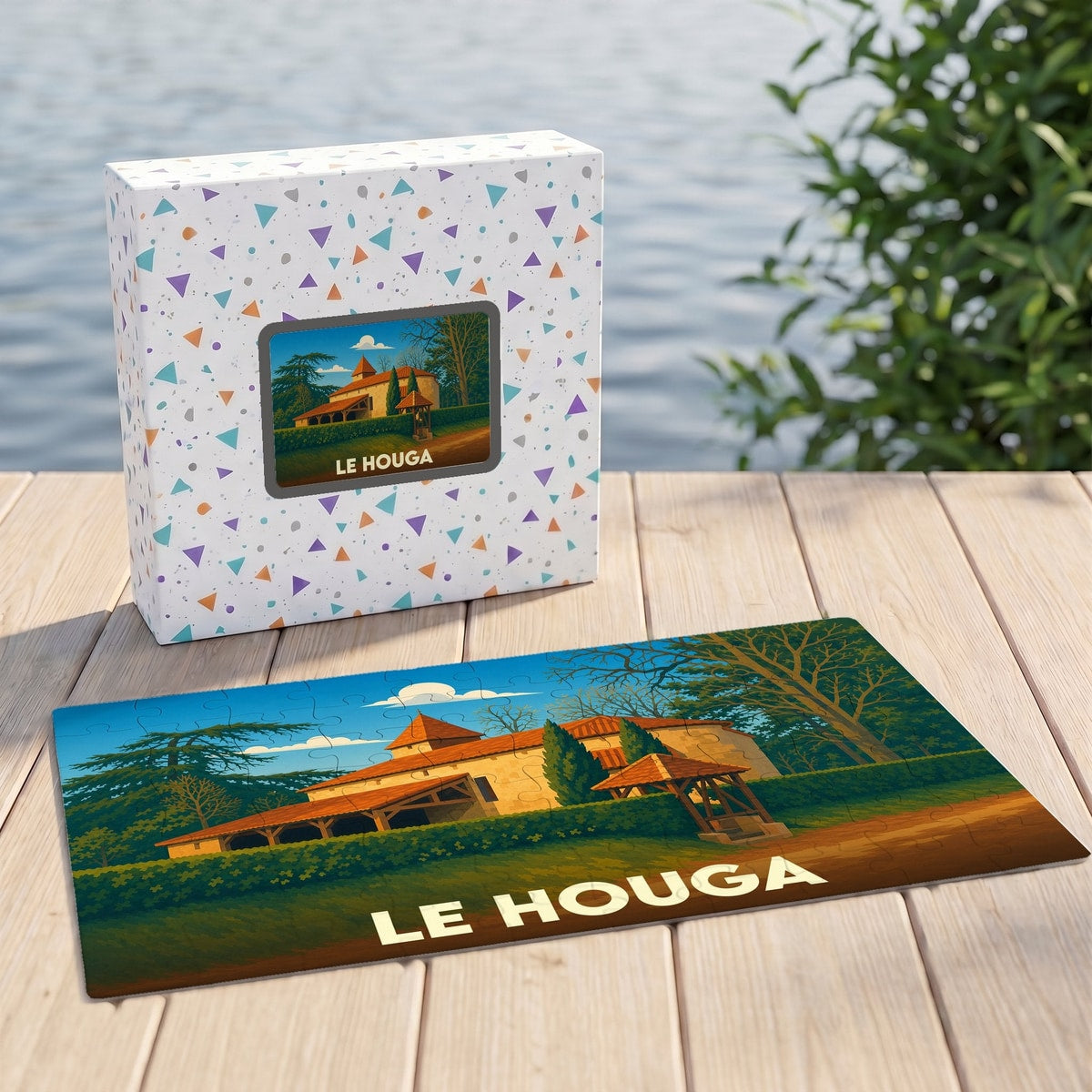 Puzzle souvenir de la ville de Le Houga avec une illustration stylisée d'un bâtiment traditionnel.