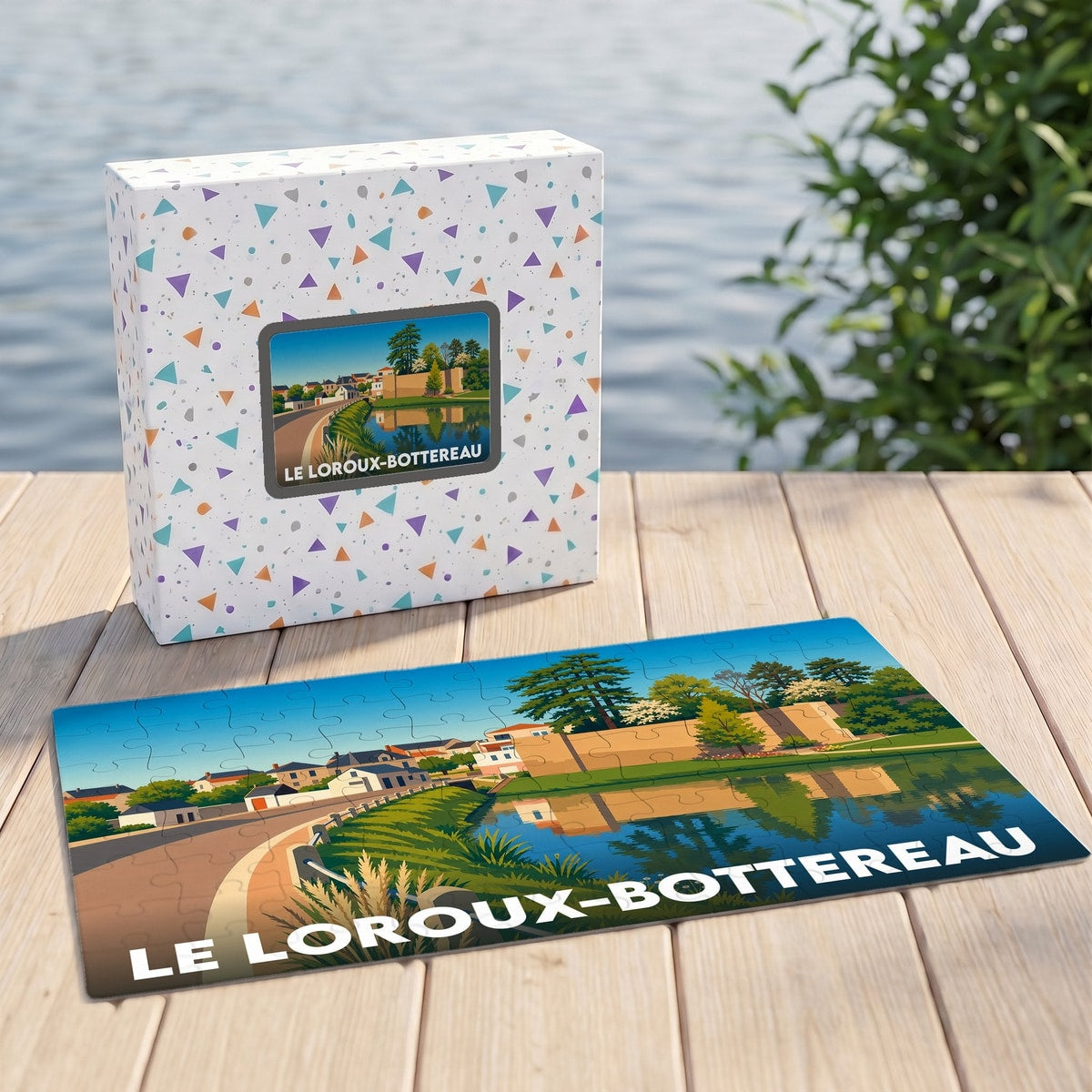 Puzzle souvenir de la ville de Le Loroux-Bottereau avec une illustration stylisée d'un paysage urbain au bord de l'eau.