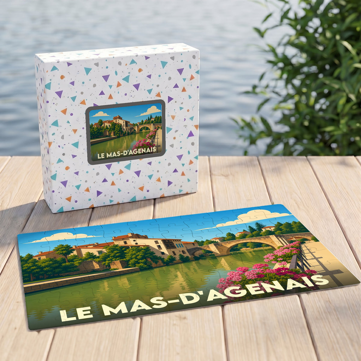 Puzzle souvenir de la ville de Le Mas-d'Agenais avec une illustration stylisée d'un pont et du canal.