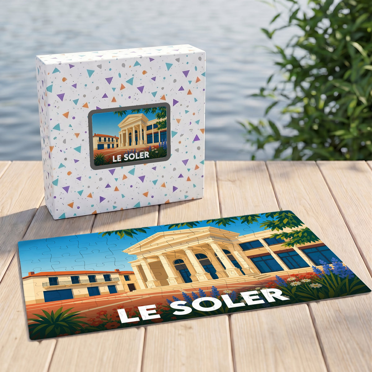 Puzzle souvenir de la ville de Le Soler avec une illustration stylisée et colorée.