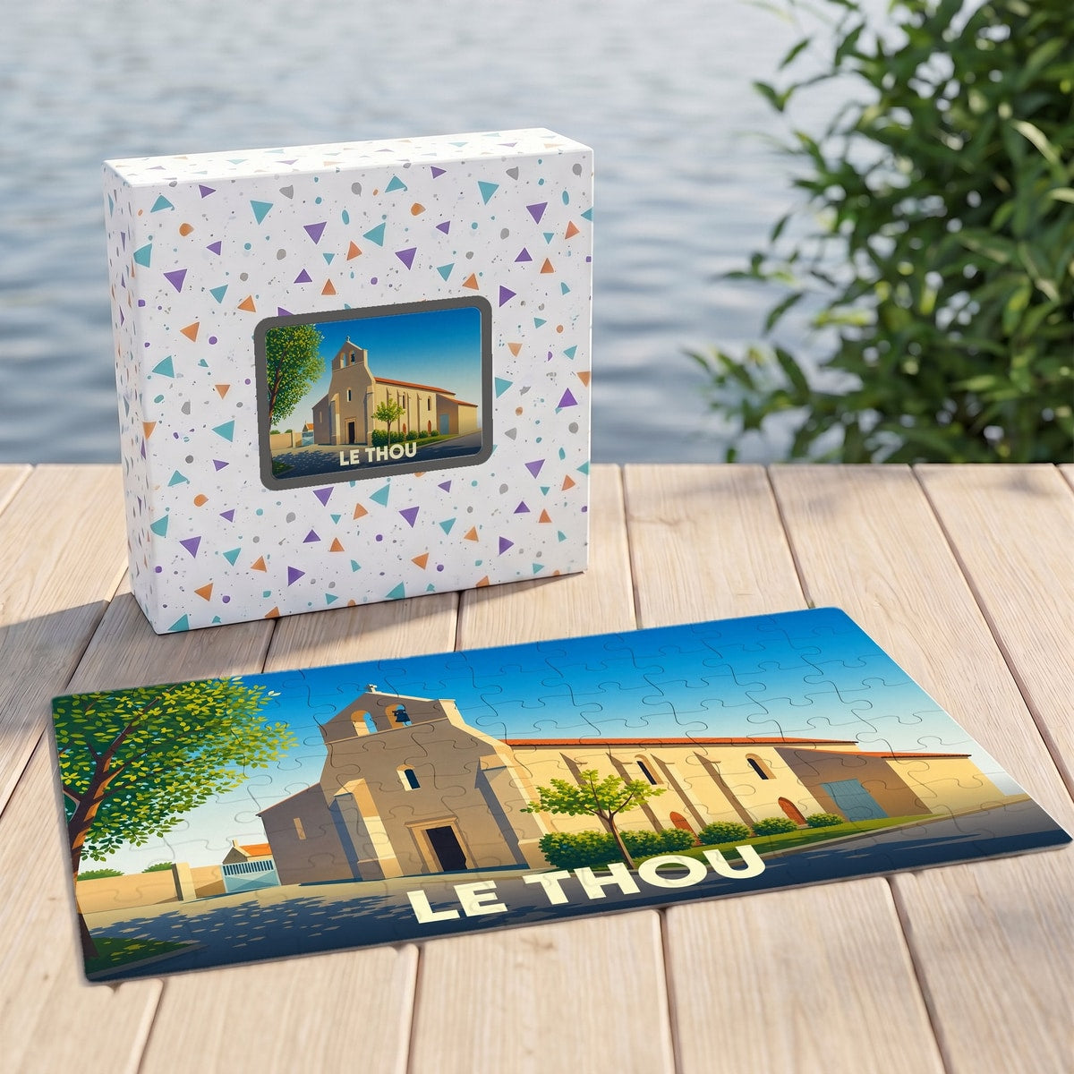 Puzzle souvenir de la ville du Thou avec une illustration stylisée de son église.
