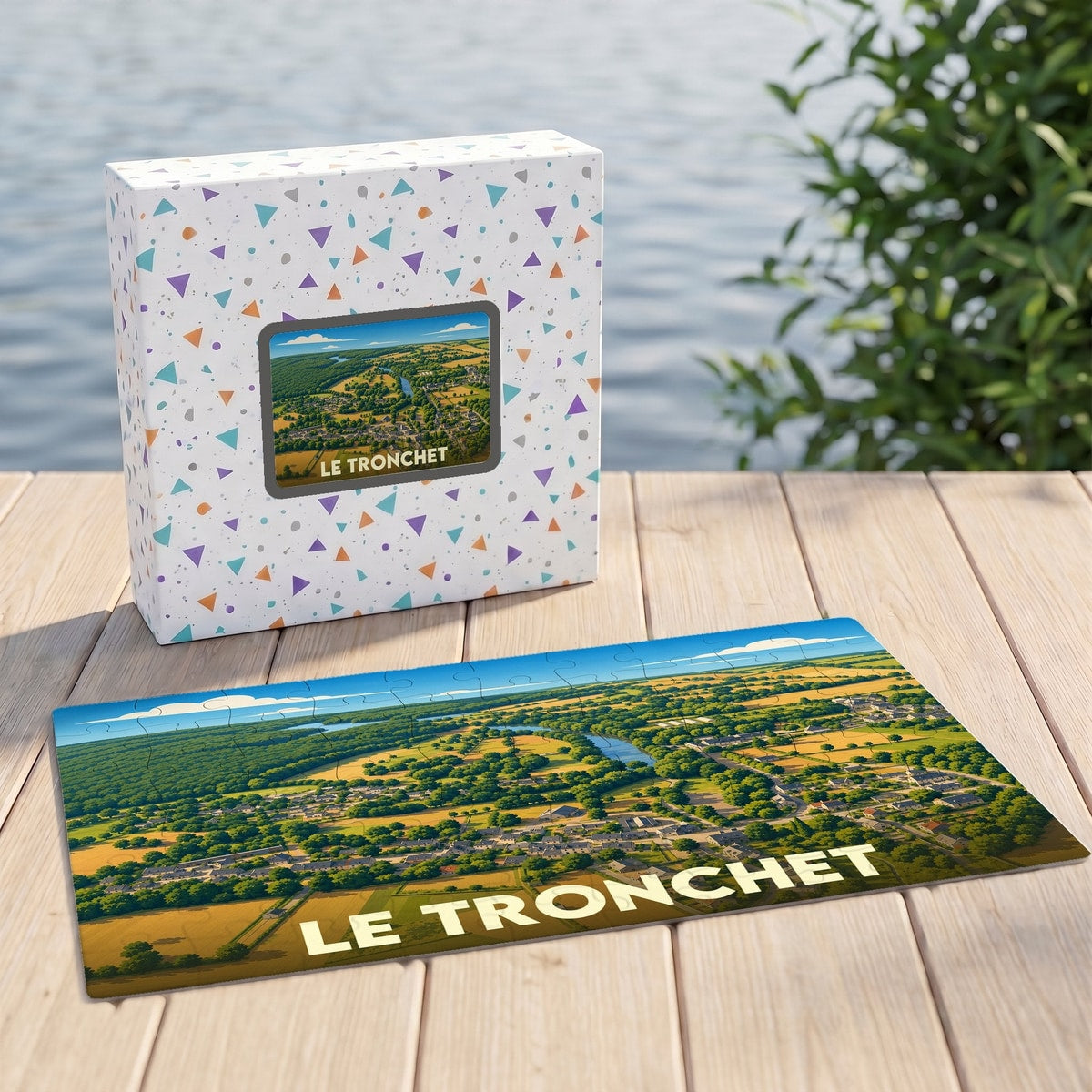 Puzzle souvenir de la ville de Le Tronchet avec une vue aérienne illustrée.