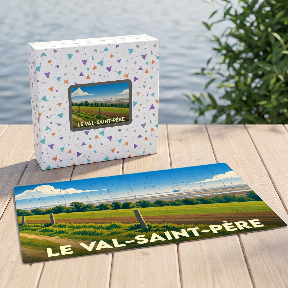 Puzzle souvenir de la ville du Val-Saint-Père avec une illustration de paysage champêtre.