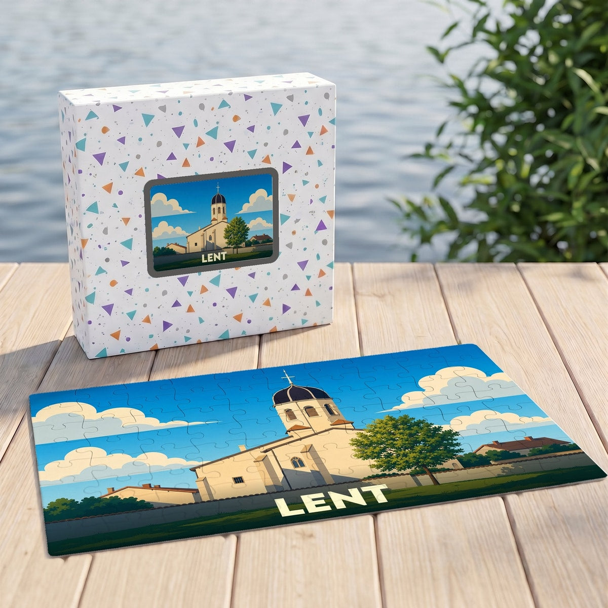 Puzzle souvenir de la ville de Lent avec une illustration stylisée d'un bâtiment historique et son coffret assorti.
