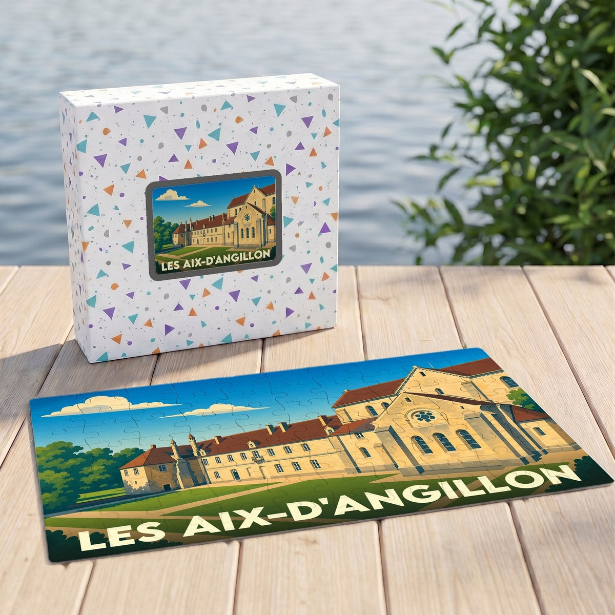Puzzle souvenir de la ville des Aix-d'Angillon avec une illustration stylisée d'un bâtiment historique.