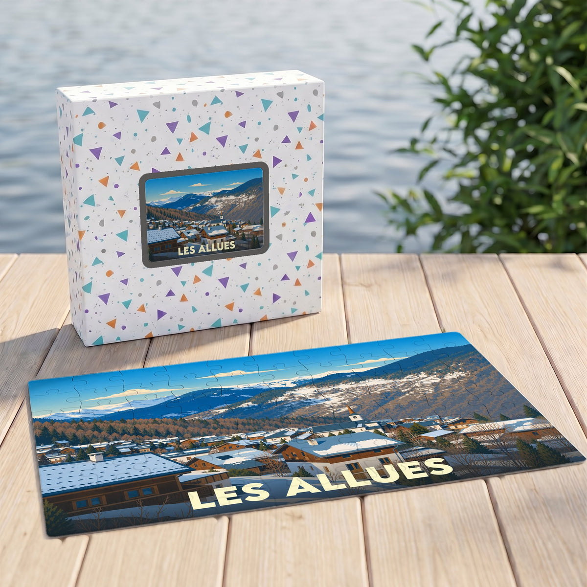 Puzzle souvenir de la ville de Les Allues avec une illustration de paysage enneigé.
