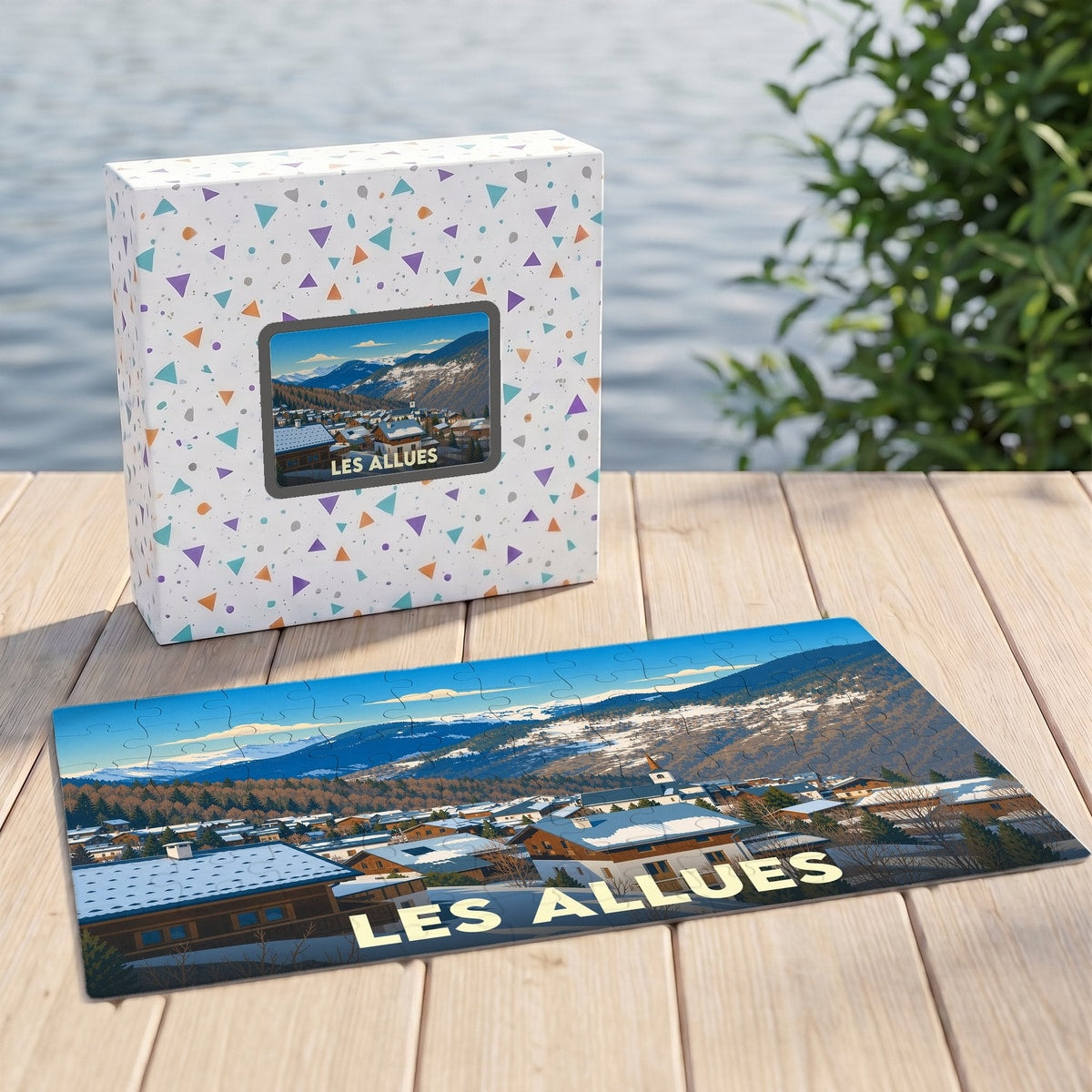Puzzle souvenir de la ville de Les Allues avec une illustration de paysage enneigé.