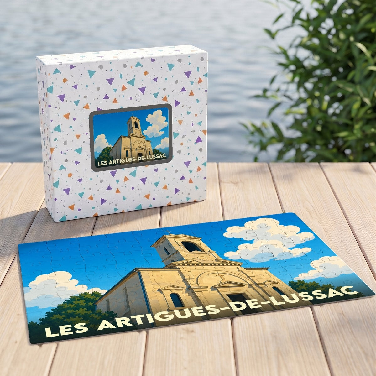Puzzle souvenir de la ville de Les Artigues-de-Lussac avec une illustration stylisée de son église.