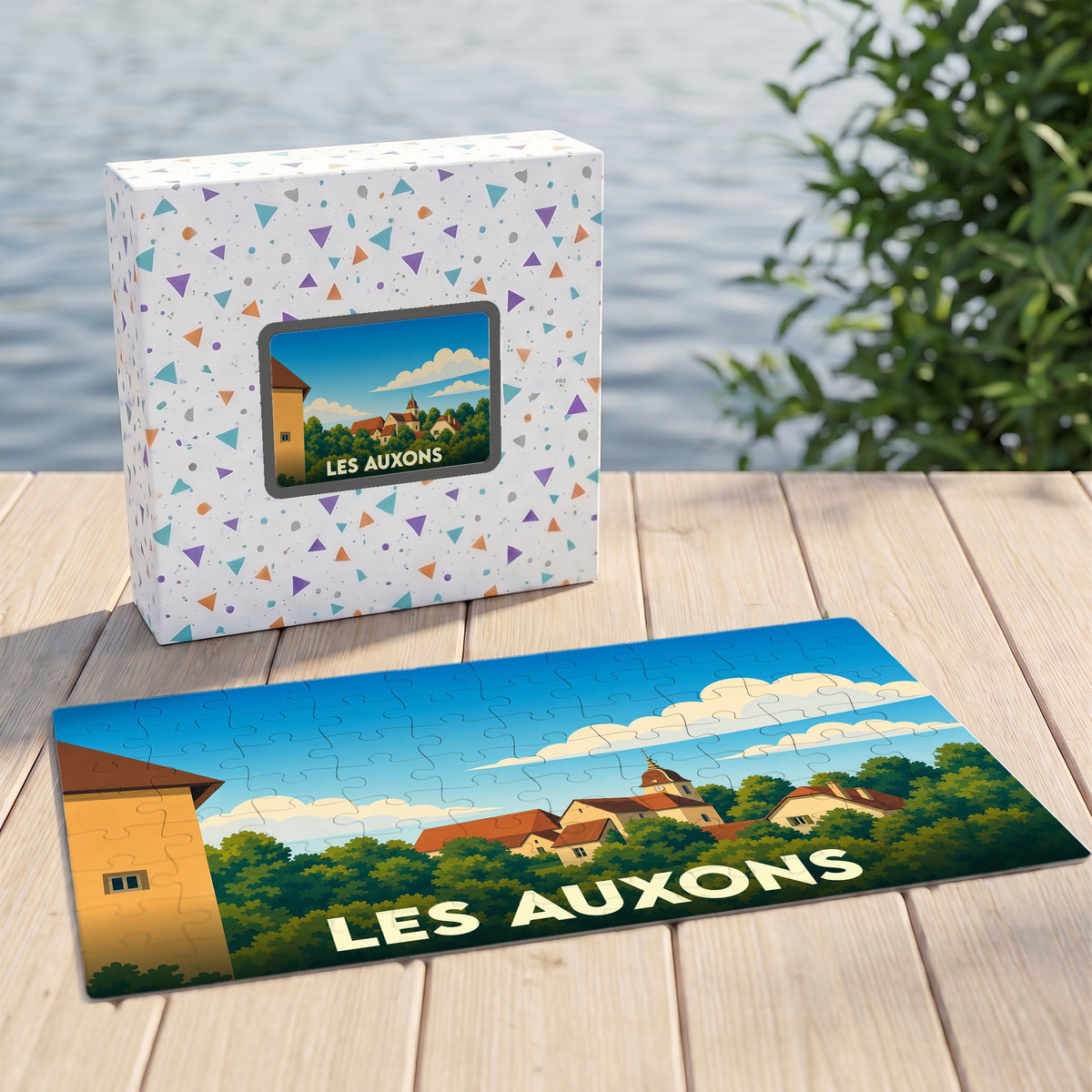 Puzzle souvenir de la ville de Les Auxons avec une illustration stylisée.