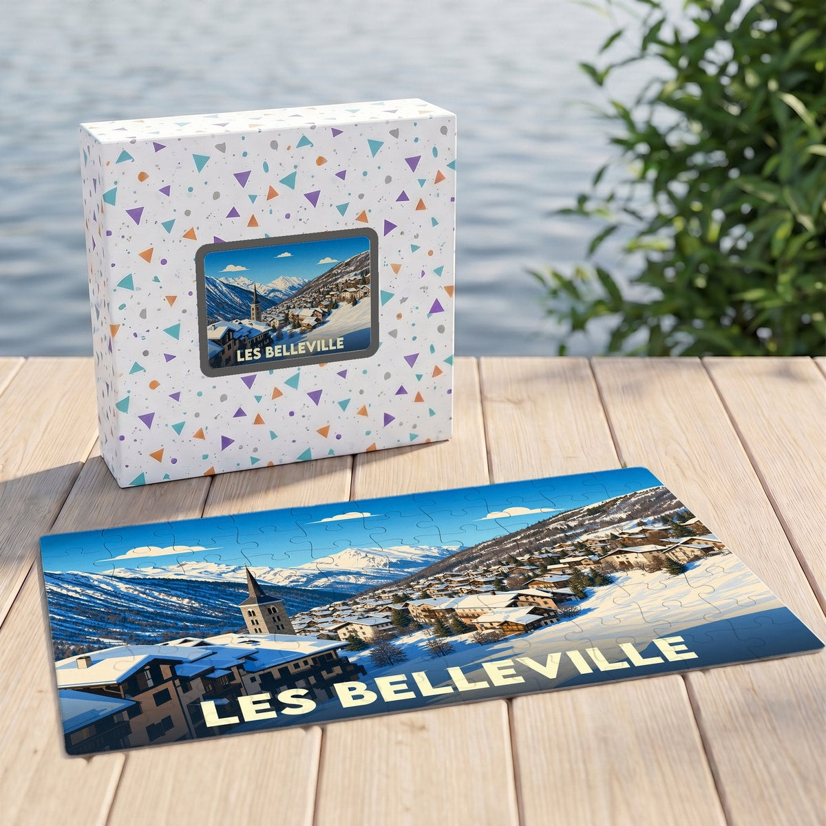 Puzzle souvenir de la ville de Les Belleville avec une illustration de paysage de montagne enneigé.