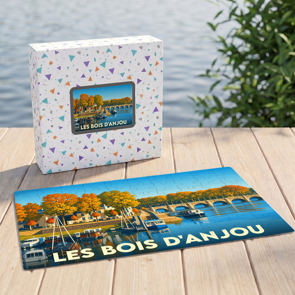Puzzle souvenir de la commune de Les Bois d'Anjou avec une illustration stylisée d'un paysage fluvial.