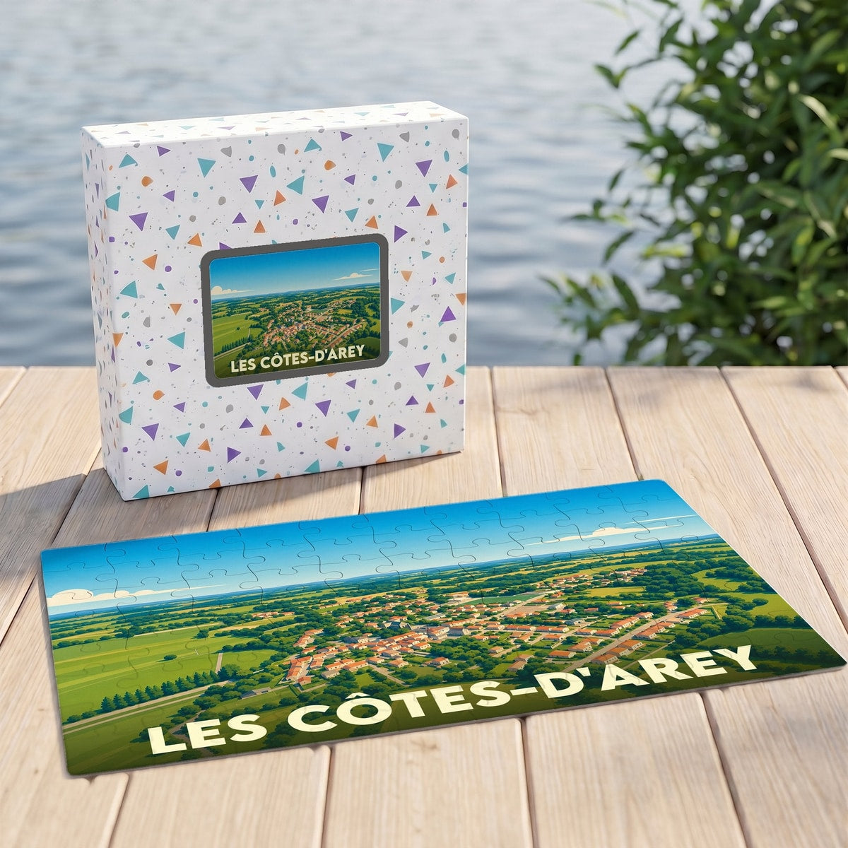 Puzzle souvenir de la commune des Côtes-d'Arey avec une illustration vue du ciel.