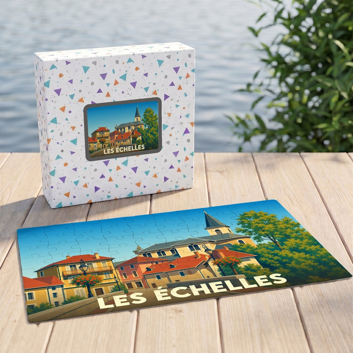 Puzzle souvenir de la ville de Les Échelles avec une illustration colorée de ses bâtiments et de son église.