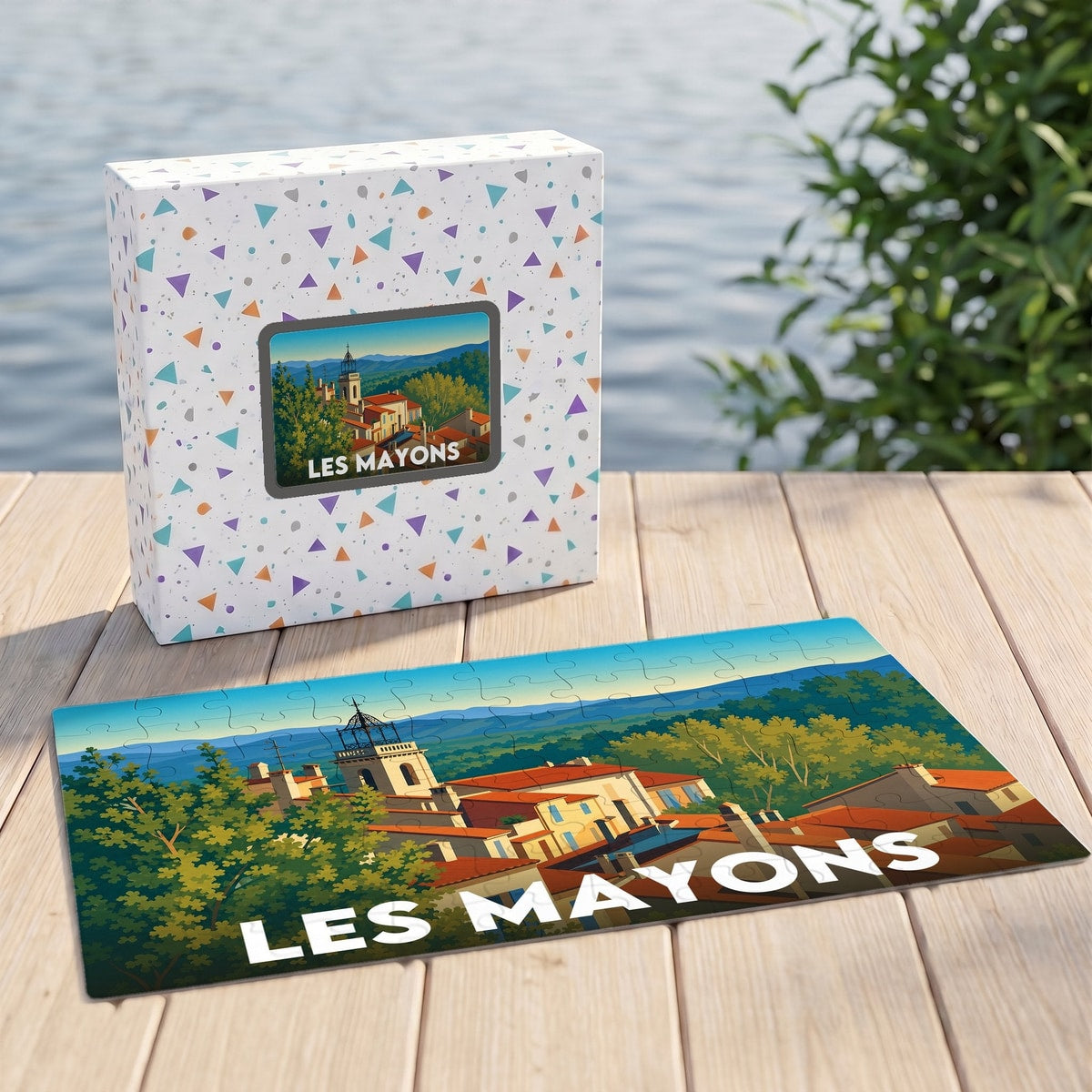 Puzzle souvenir de la ville de Les Mayons avec une illustration stylisée et colorée.