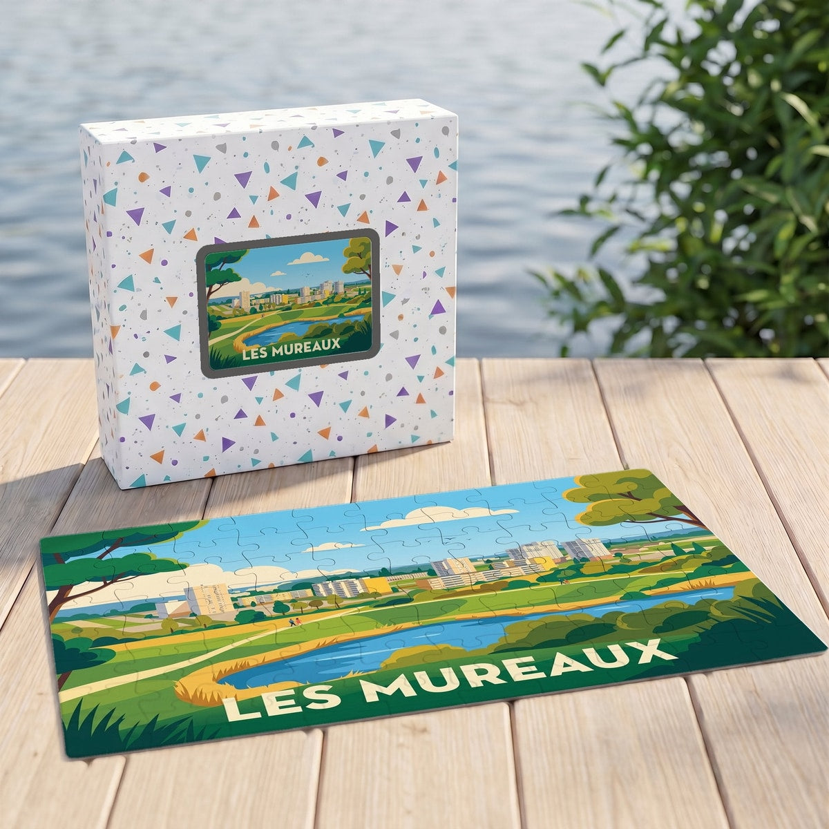 Puzzle souvenir de la ville des Mureaux avec une illustration stylisée et sa boîte assortie.
